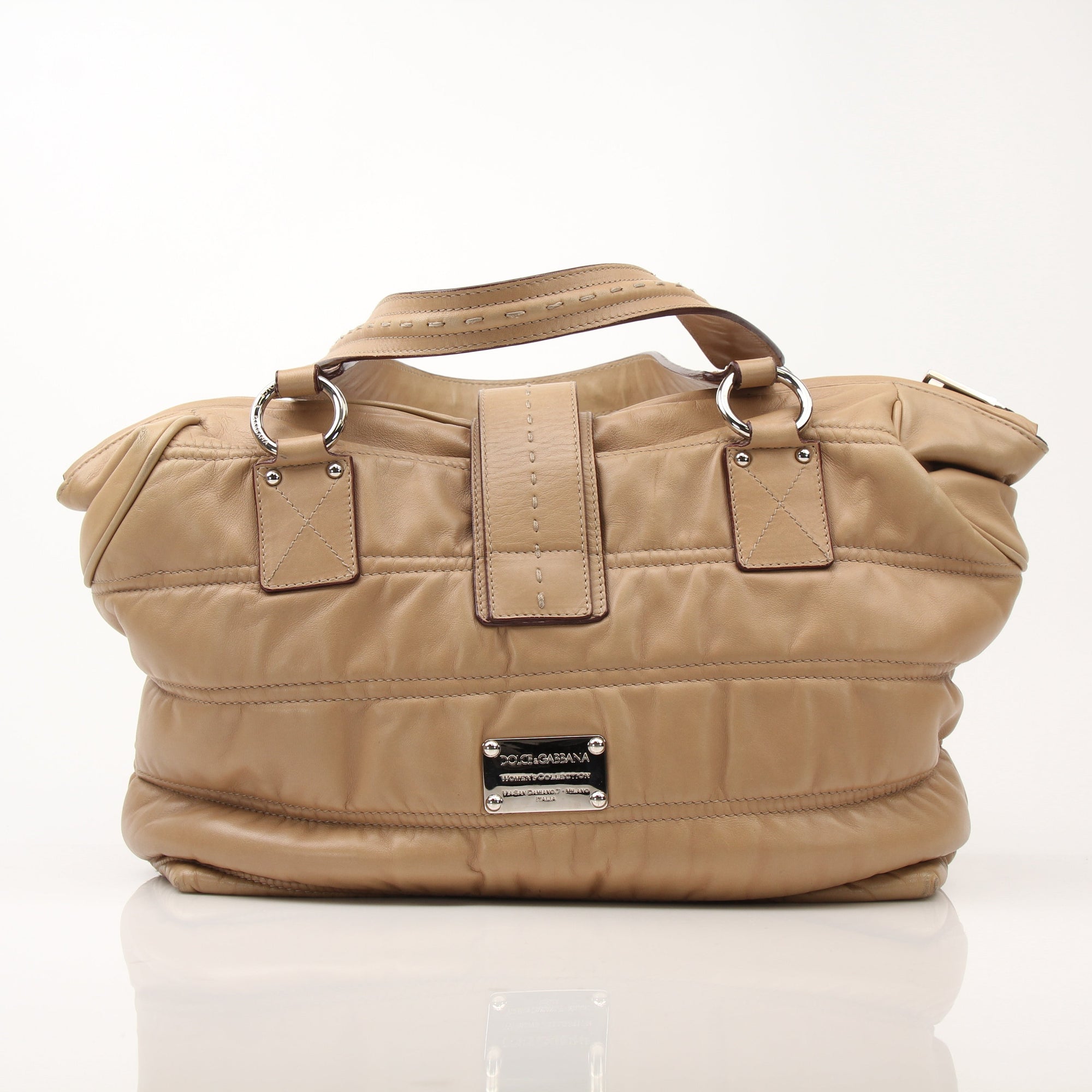 Dolce & Gabbana beige Miss Very Sexy vintage shoulder handbag with gold hardware and classic design.