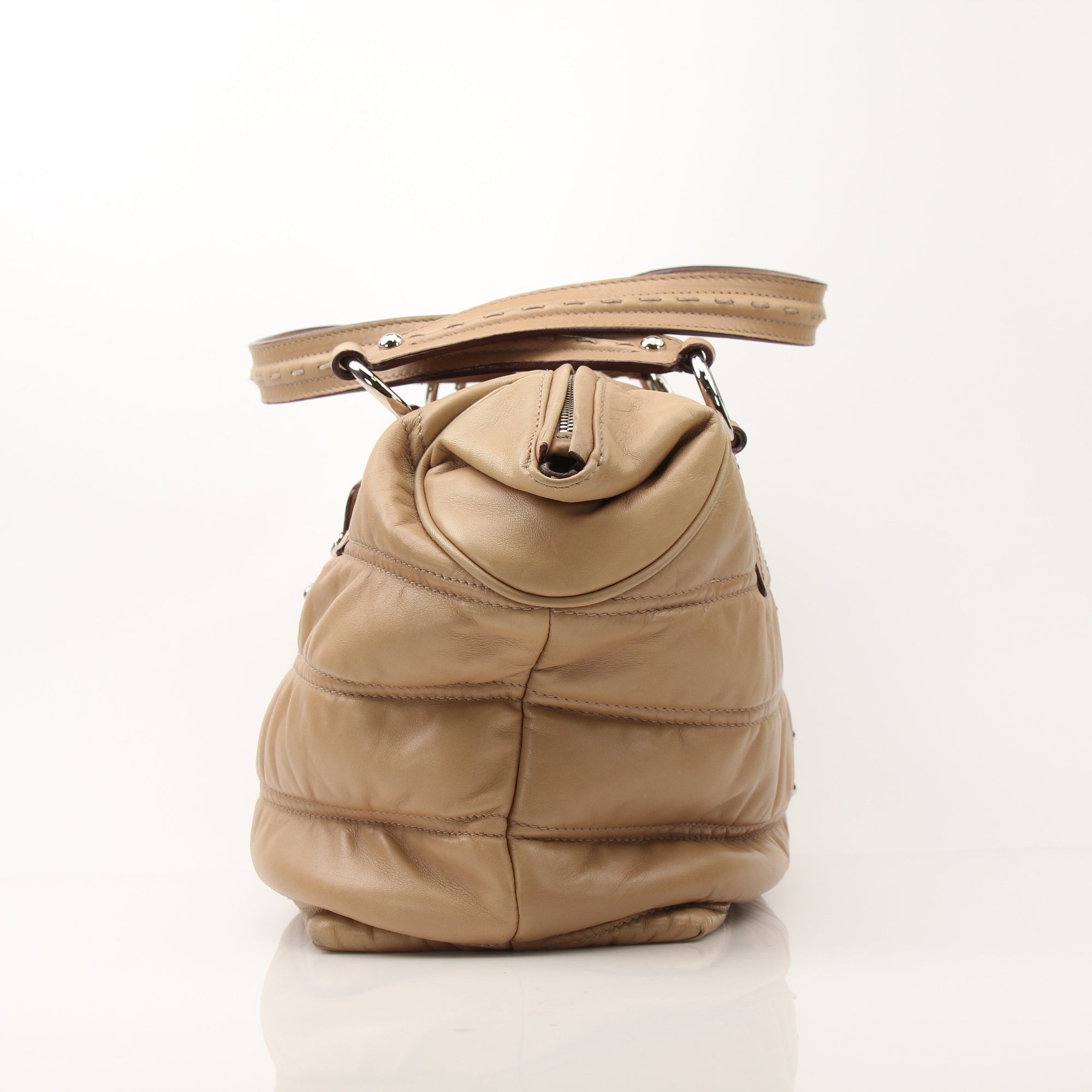 Beige Dolce & Gabbana Miss Very Sexy vintage shoulder handbag with gold hardware, stylish and elegant for women.