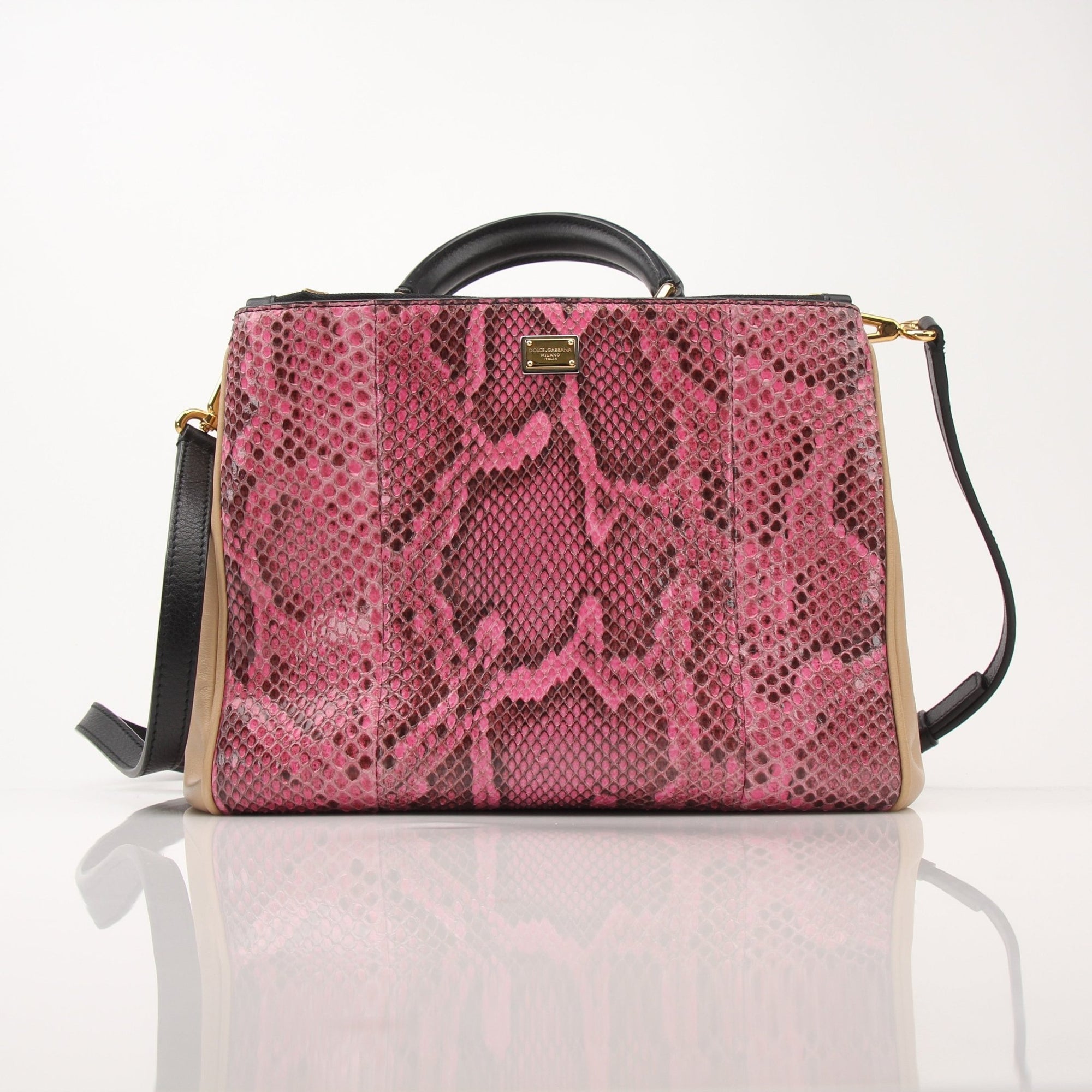Dolce & Gabbana Miss Sicily pink python top handle handbag with gold accents and elegant design.