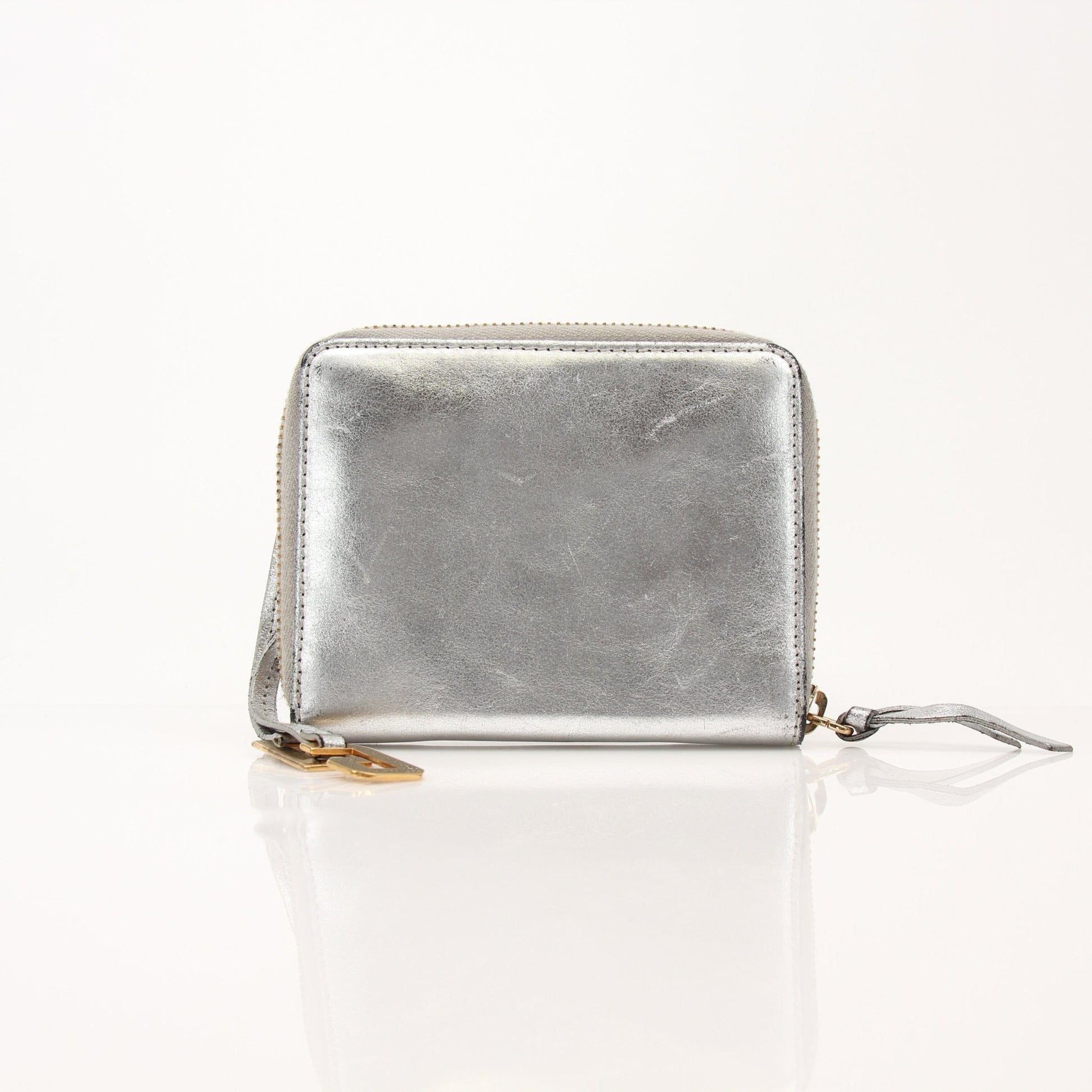 Dolce & Gabbana metallic silver zip-around wallet with sleek design and gold-tone accents, crafted by Gold & Beyond.