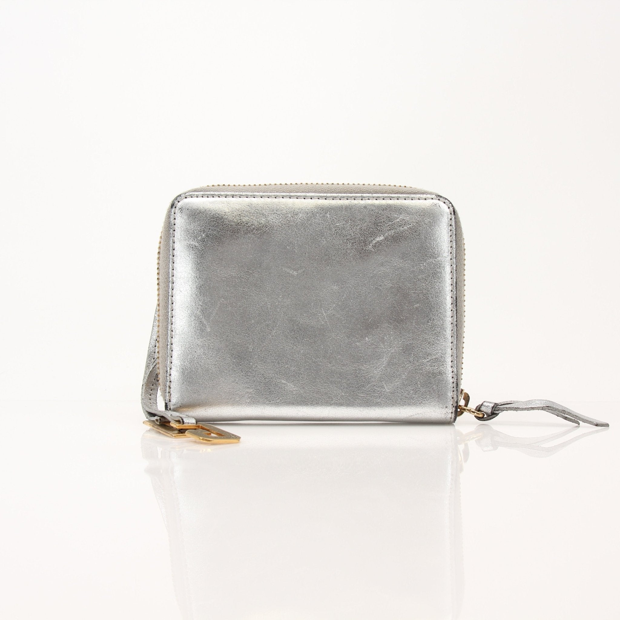 Dolce & Gabbana metallic silver zip-around wallet with sleek design and gold-tone accents, crafted by Gold & Beyond.