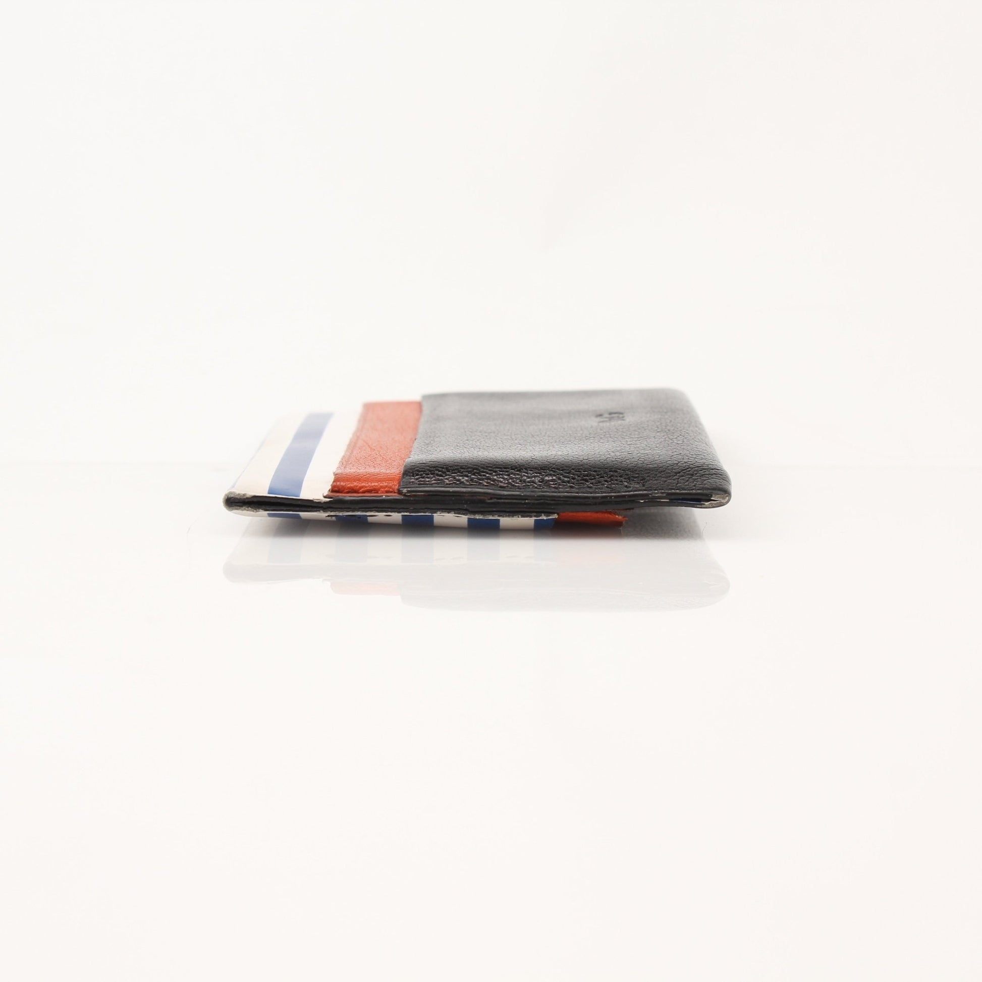 Dolce & Gabbana multicolor cardholder with multiple card slots, displayed on a neutral background.