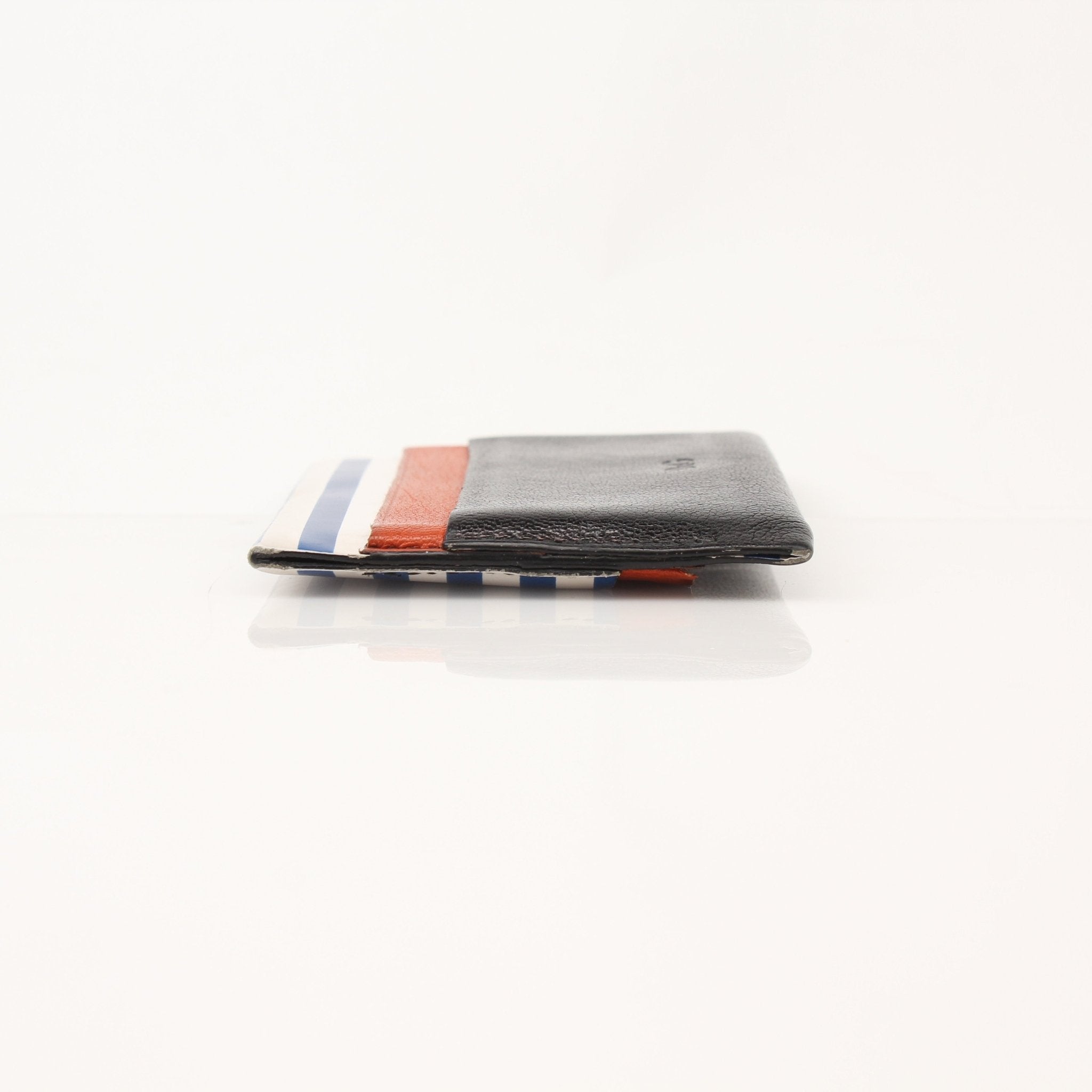 Dolce & Gabbana multicolor cardholder with multiple card slots, displayed on a neutral background.
