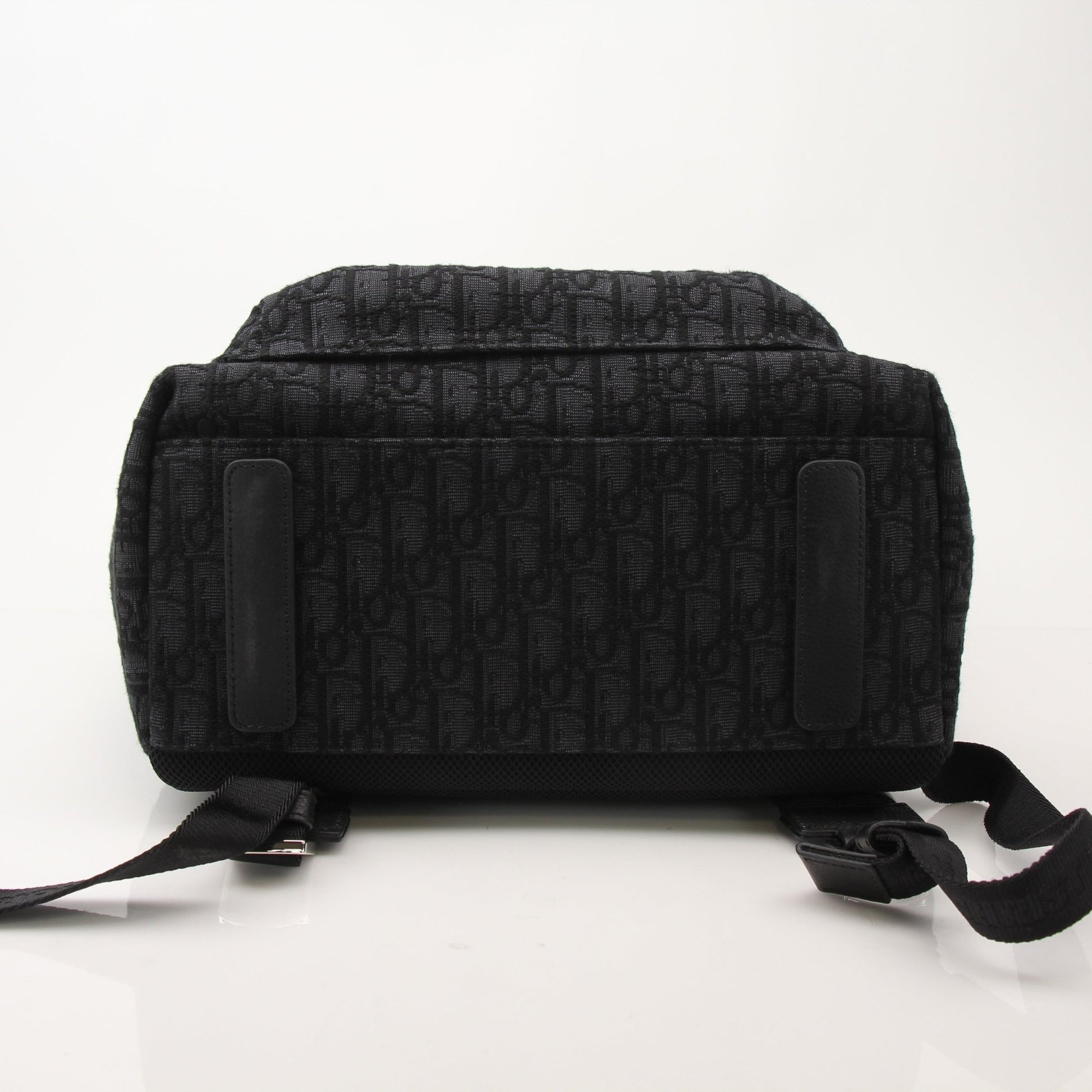Christian Dior Oblique Canvas Backpack, Gold & Beyond travel bag with iconic monogram pattern and adjustable straps.