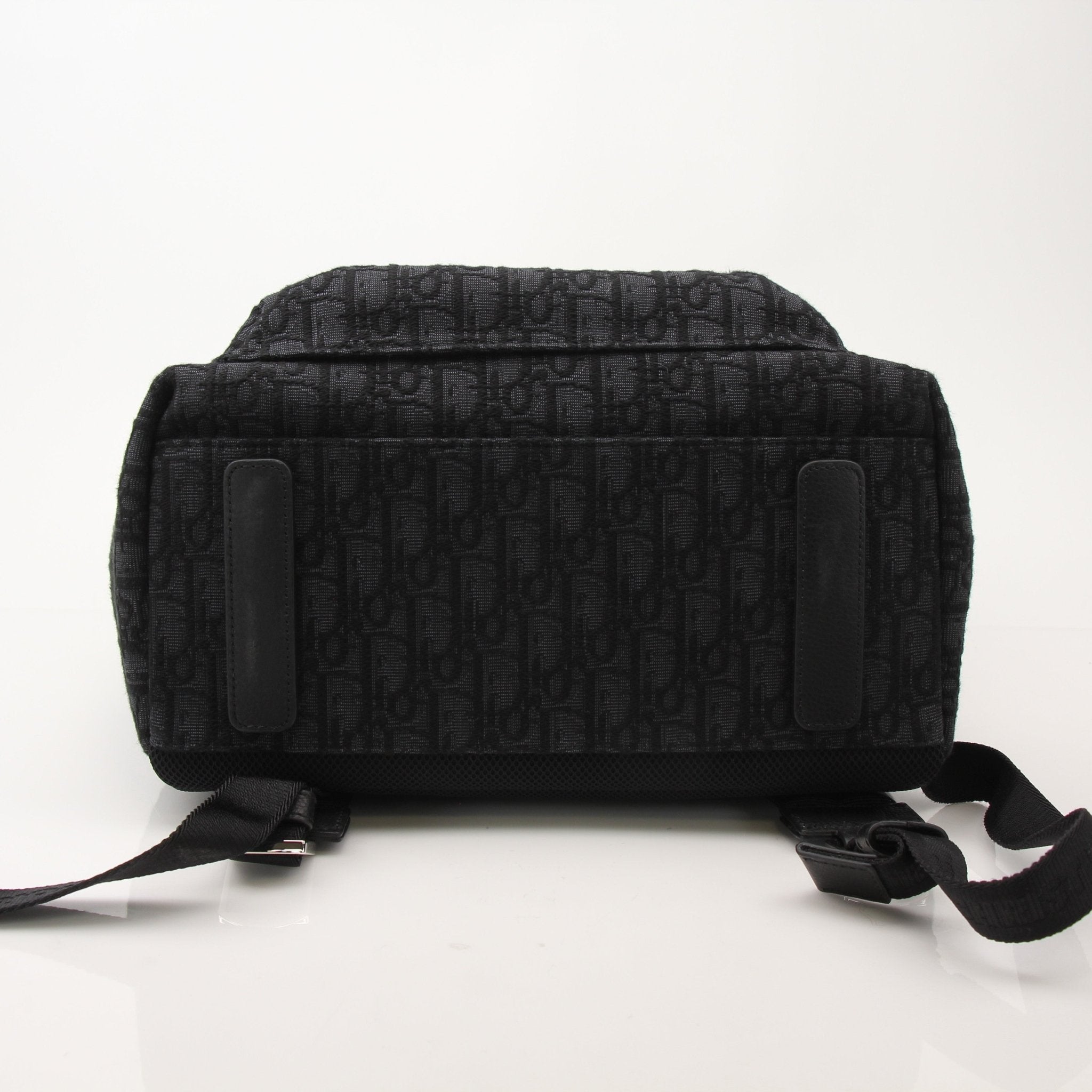 Christian Dior Oblique Canvas Backpack, Gold & Beyond travel bag with iconic monogram pattern and adjustable straps.