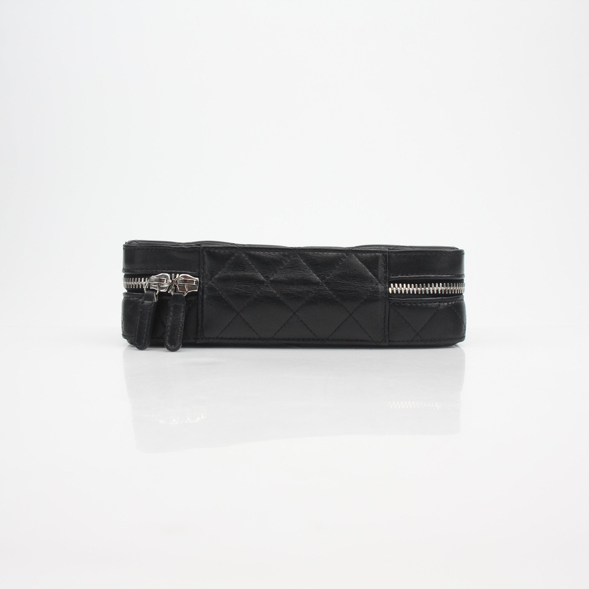 Gold & Beyond Chanel quilted lambskin vanity case with gold hardware, compact and stylish for makeup and accessories.