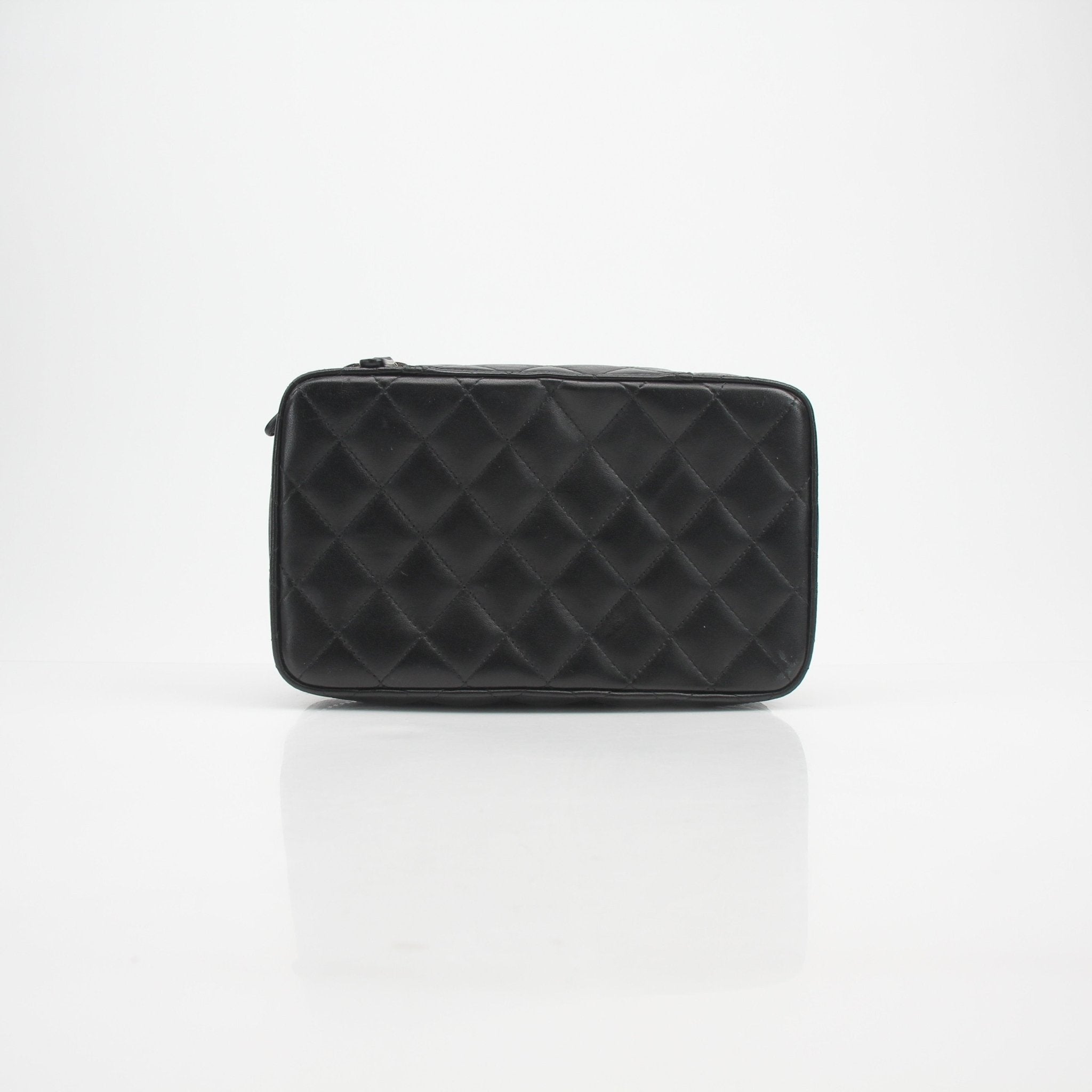Gold & Beyond Chanel Quilted Lambskin Vanity Case with gold hardware, featuring a compact, elegant design and quilted texture.