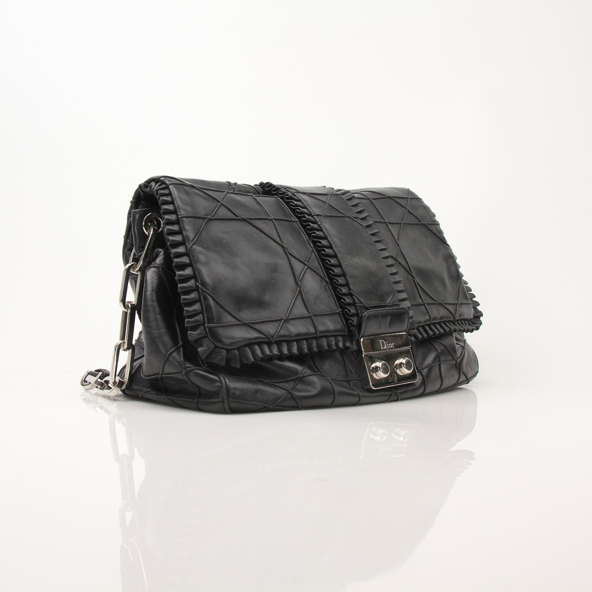 Christian Dior New Lock Ruffle Handbag by Gold & Beyond featuring ruffle details and a sleek lock closure.