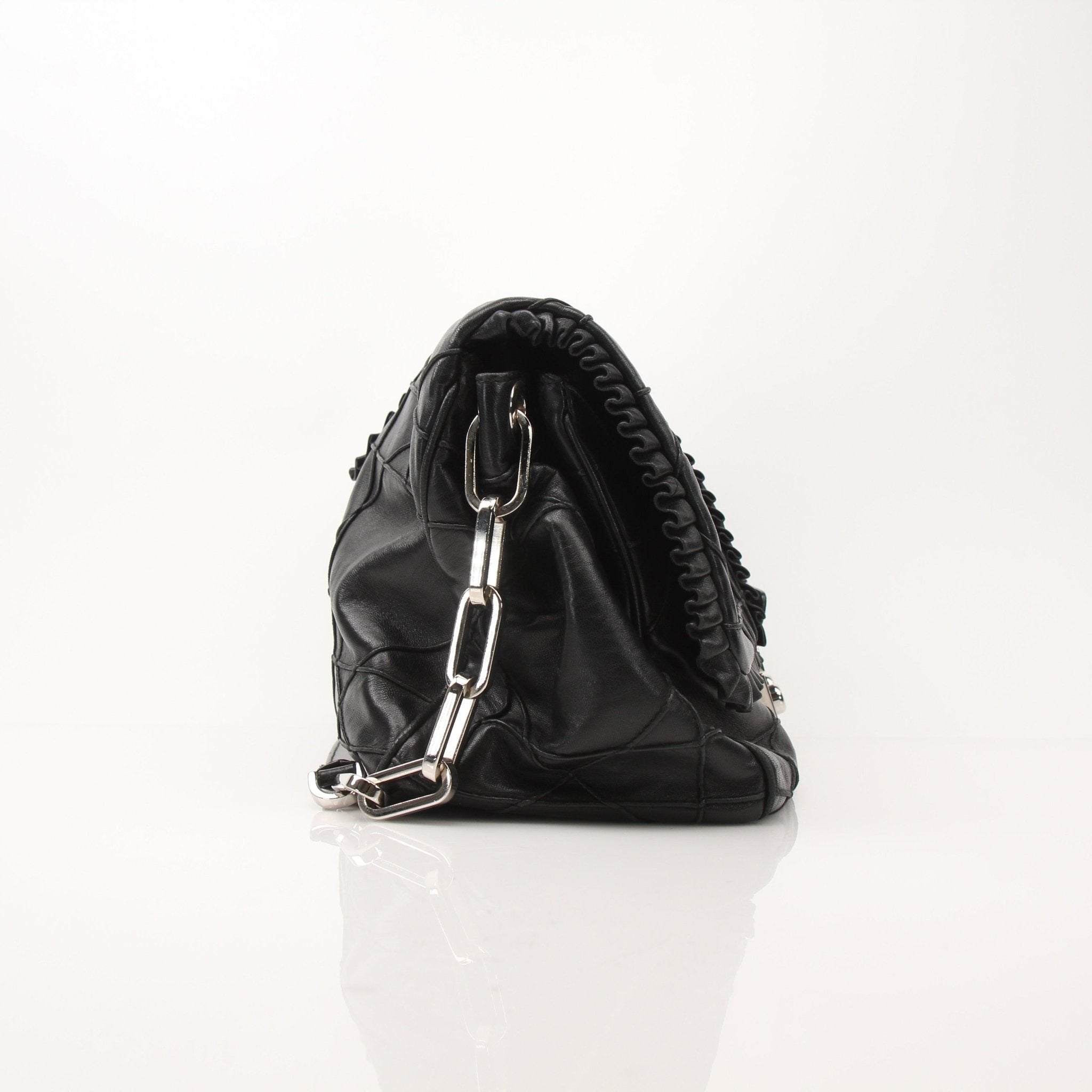 Christian Dior New Lock Ruffle handbag by Gold & Beyond, showcasing its elegant design and ruffle detailing.