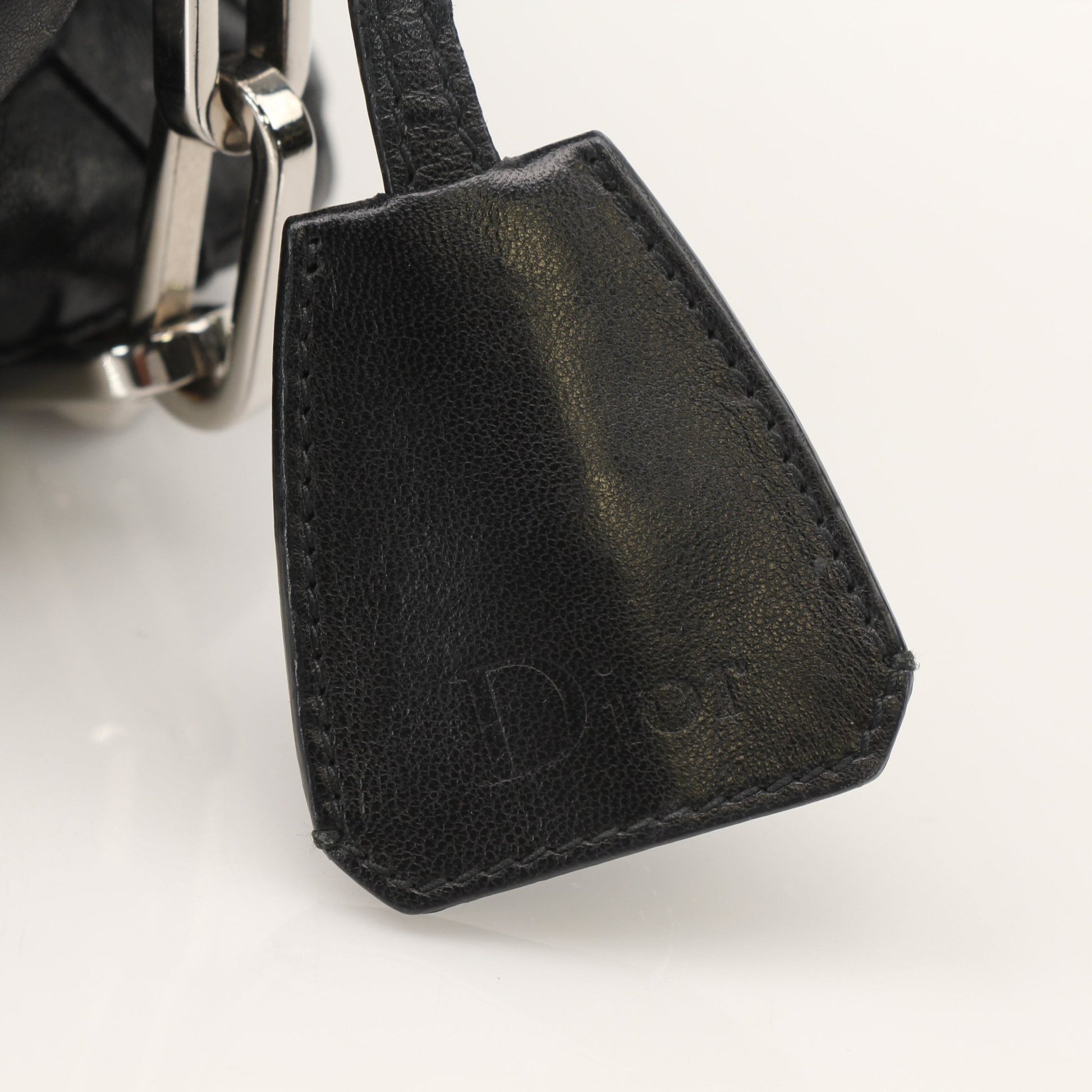 Christian Dior New Lock Ruffle handbag by Gold & Beyond, featuring a stylish design with ruffle accents and a classic handbag shape.
