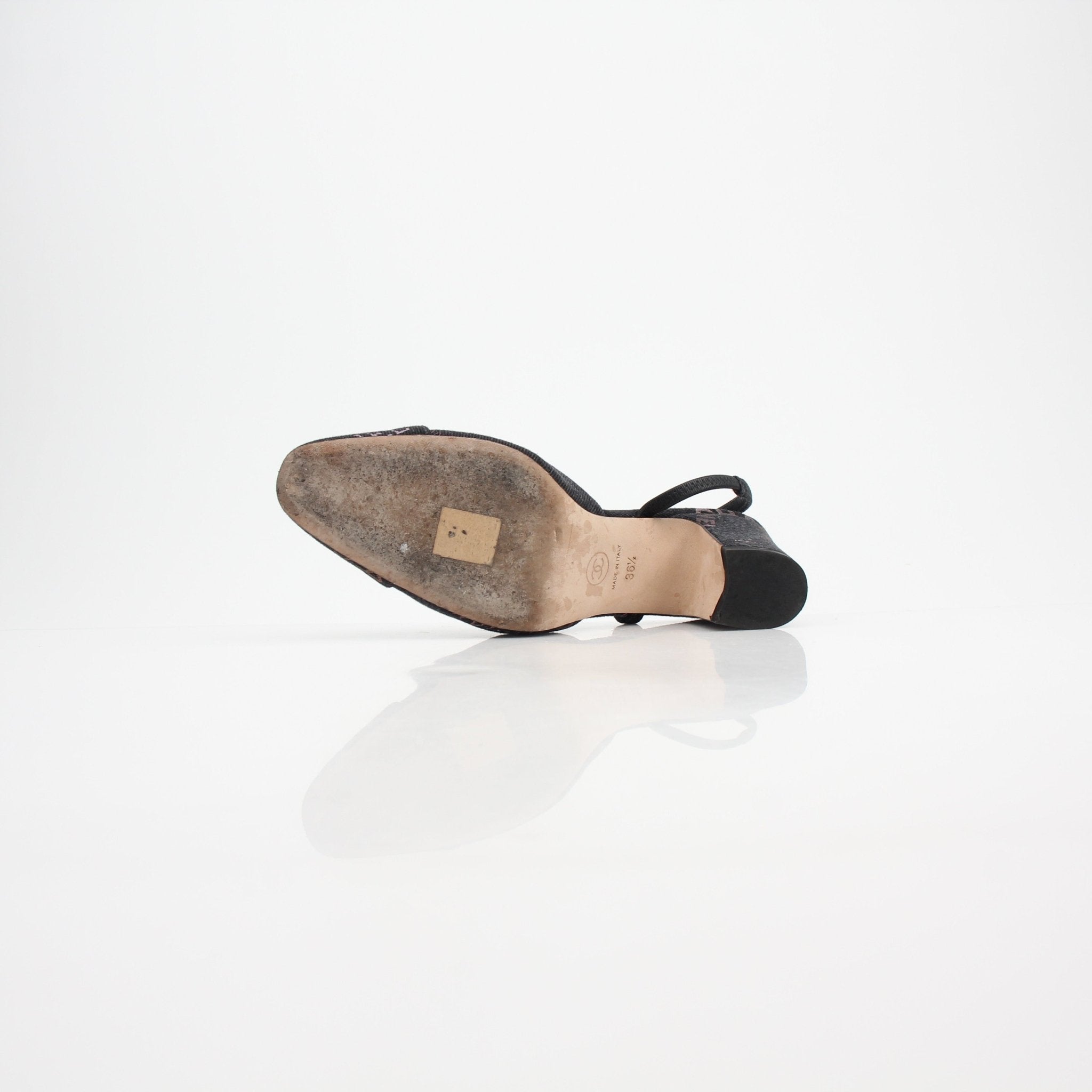 Gold & Beyond Chanel 22P Logo-Print Denim Slingback Pumps shoes with stylish denim and logo print design.