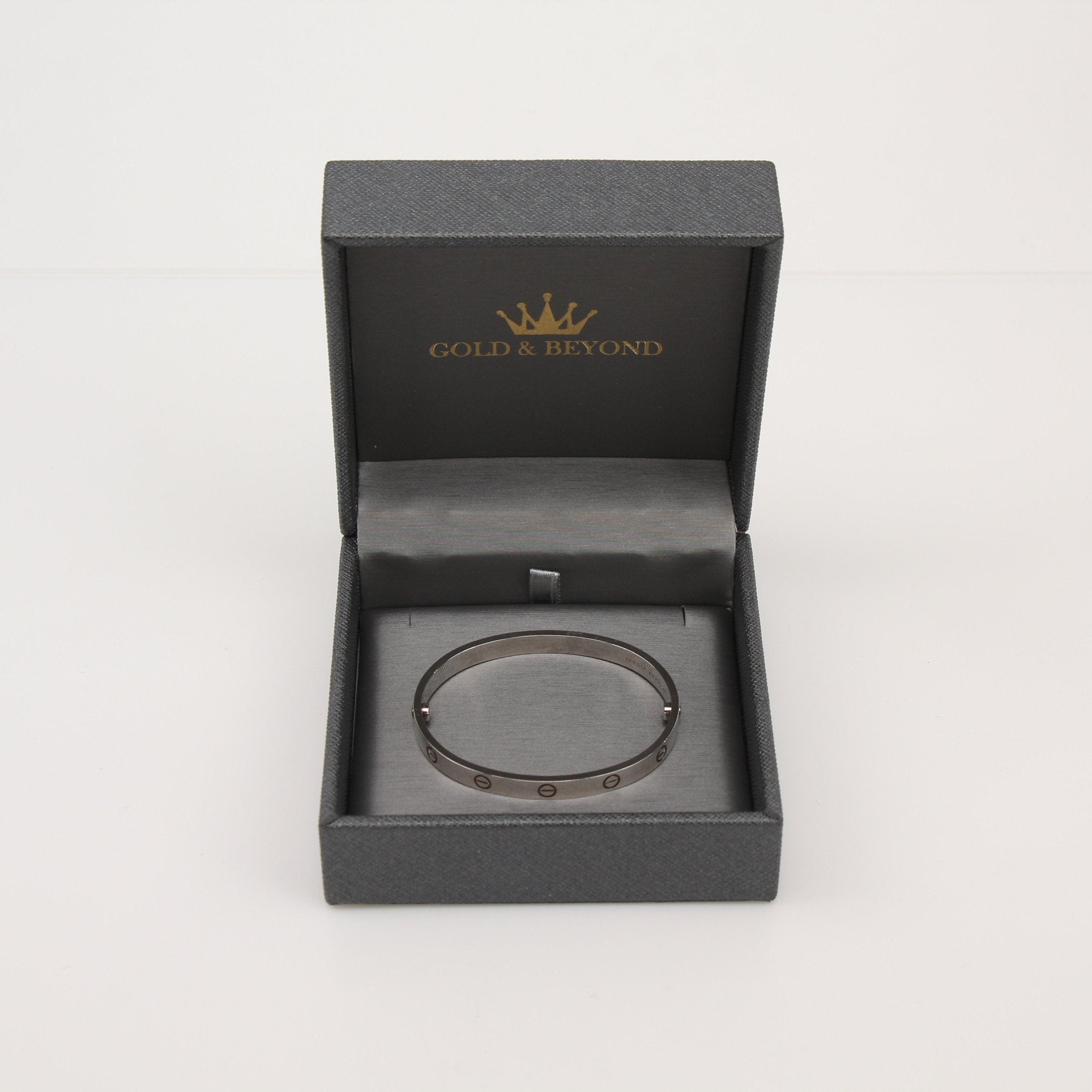 Gold & Beyond Cartier Love Bracelet jewelry with signature screw motifs on polished gold band.