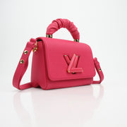 Louis Vuitton Twist One Handle PM in Pondichéry Pink Taurillon Leather