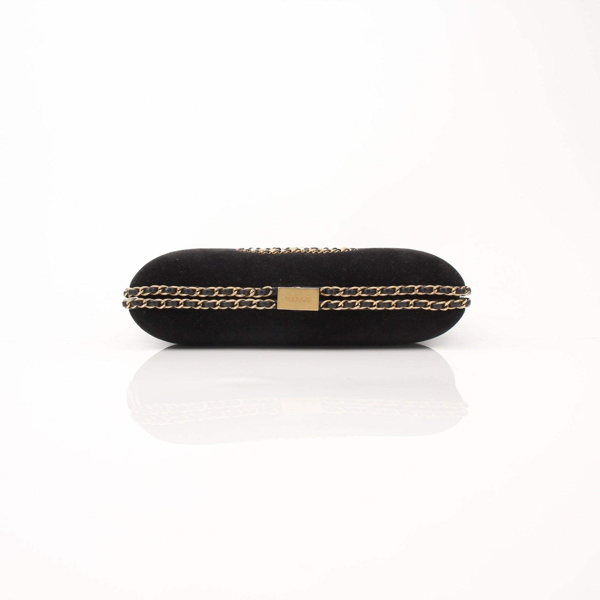 Chanel black velour CC chain around evening clutch handbag with gold accents and elegant design.