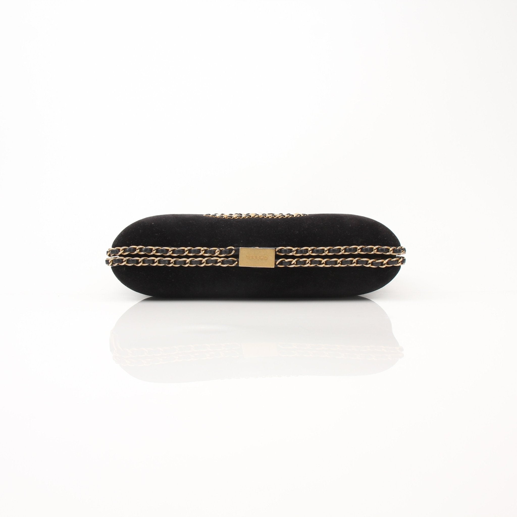 Chanel black velour CC chain around evening clutch handbag with gold accents and elegant design.