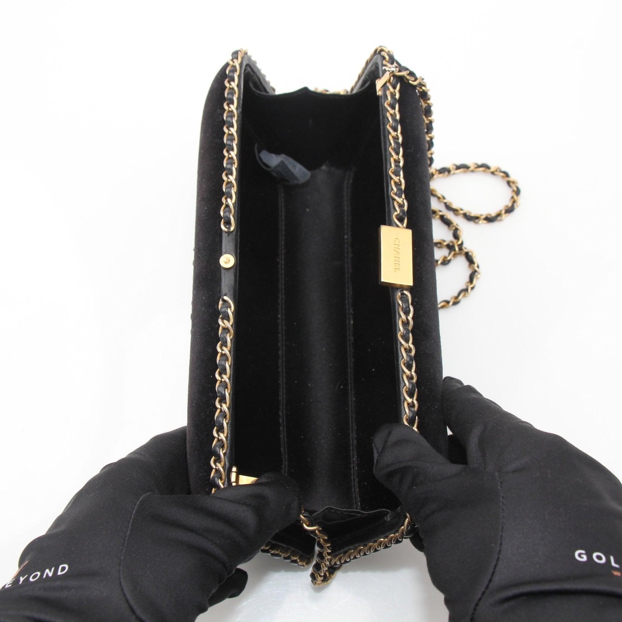 Chanel black velour CC chain around evening clutch handbag with gold-tone chain and logo detailing, stylish for evening occasions.