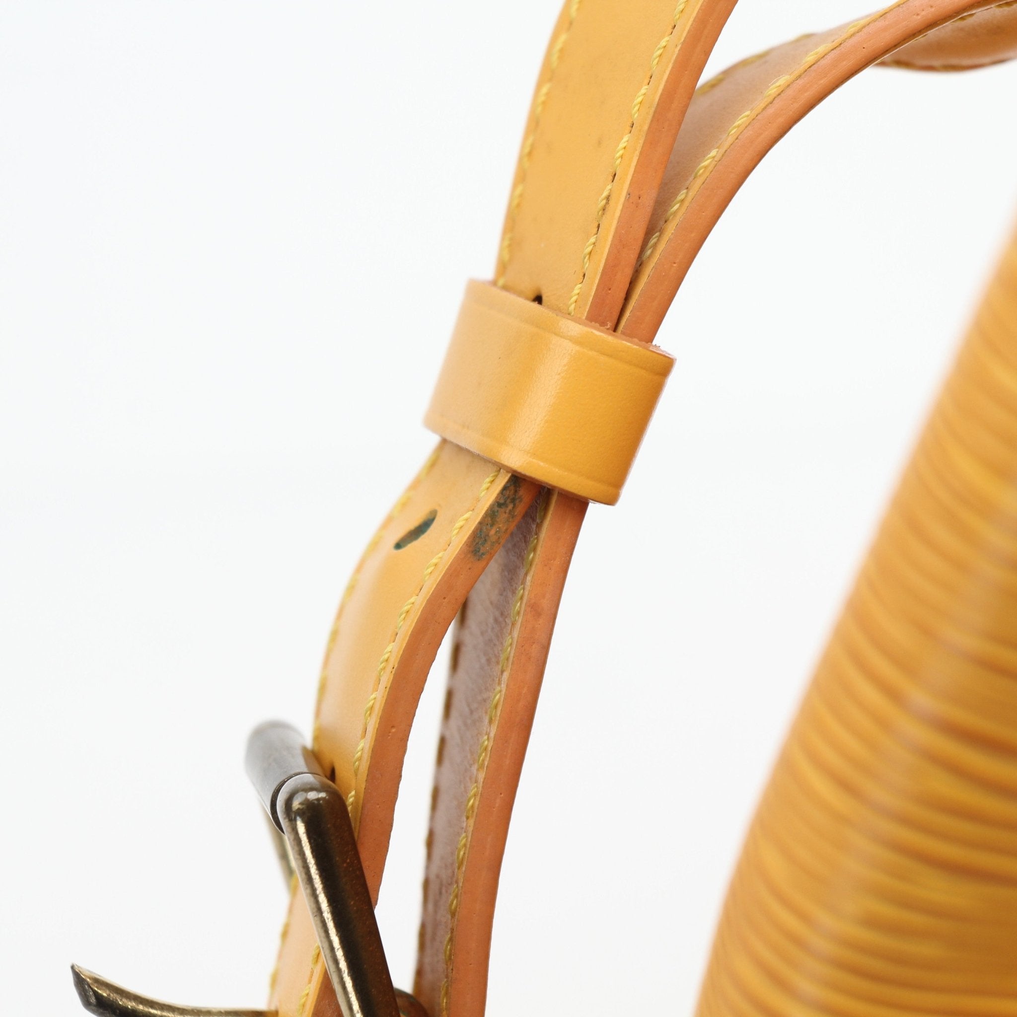 Louis Vuitton Noé GM yellow Epi leather bucket handbag with gold-tone hardware and adjustable shoulder strap.