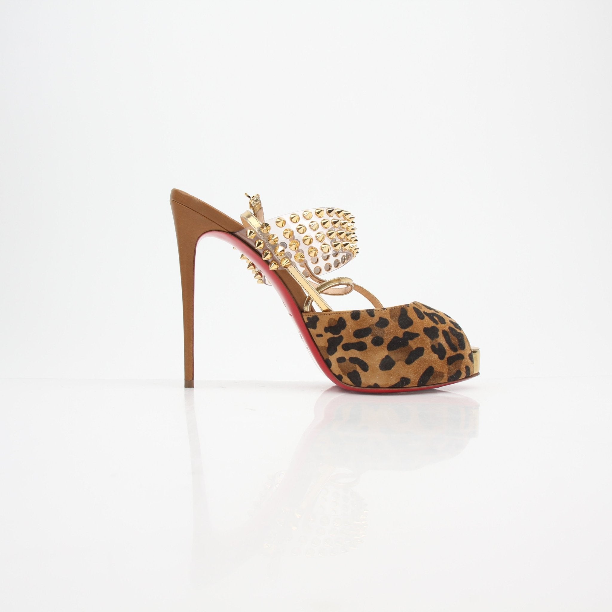 Christian Louboutin Levitagirl 120 platform sandals with gold accents and red soles, shown in a close-up view.