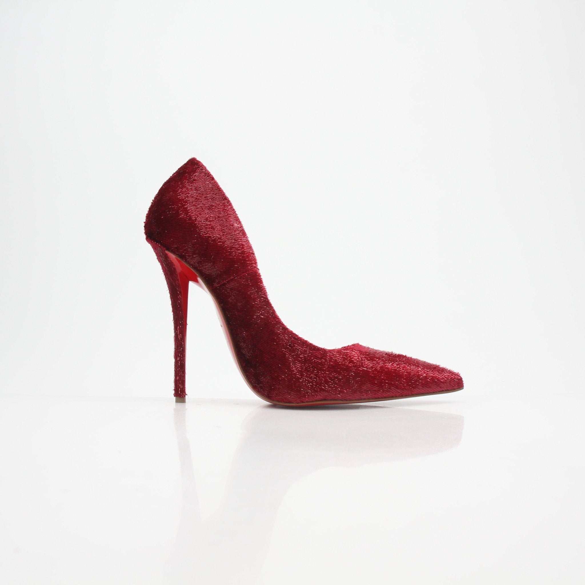 Christian Louboutin Miss Z velvet glitter pumps, black heels with red soles, featuring luxurious velvet and sparkling glitter details.