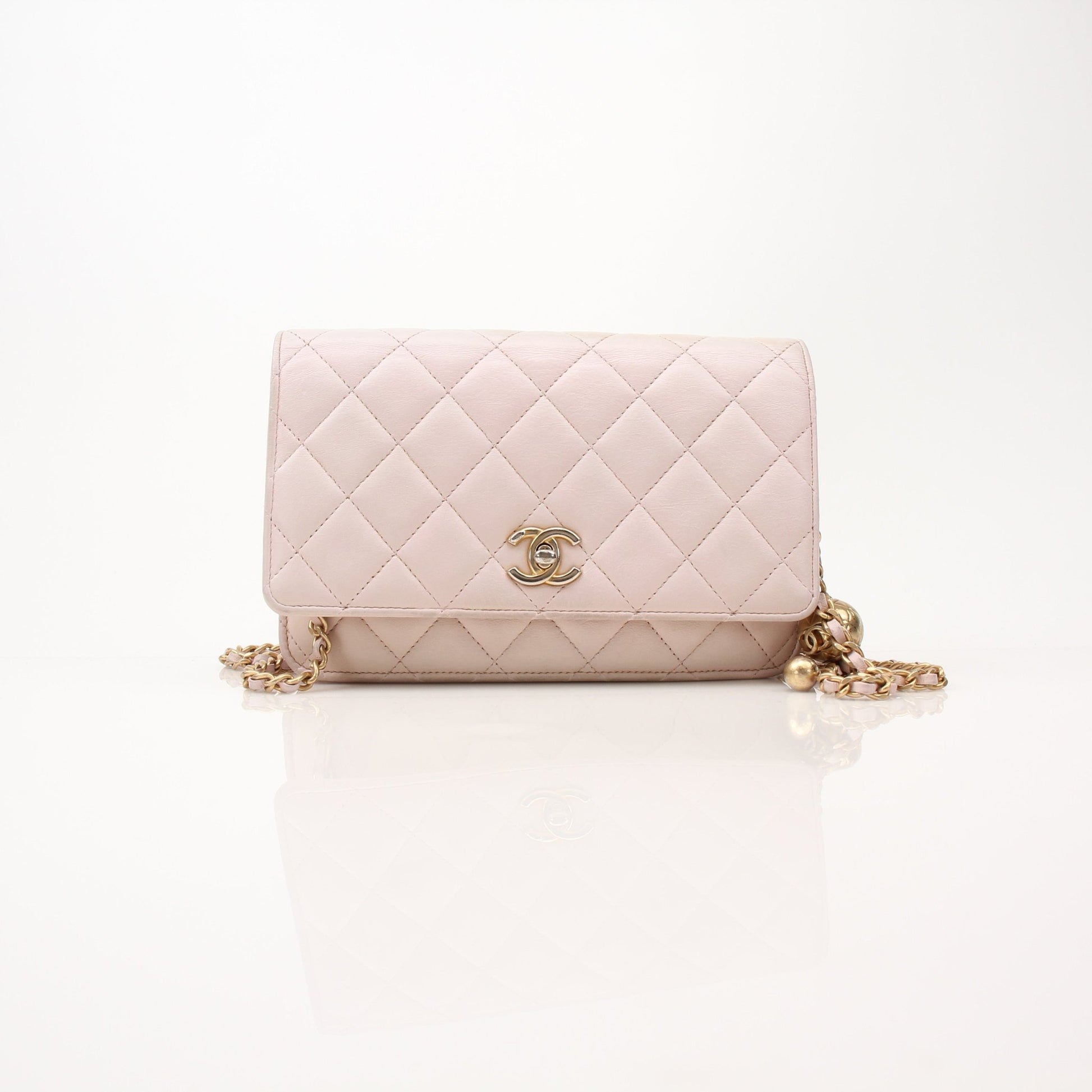 Chanel blush pink wallet on chain by Gold & Beyond, featuring a compact wallet with chain strap and elegant design.