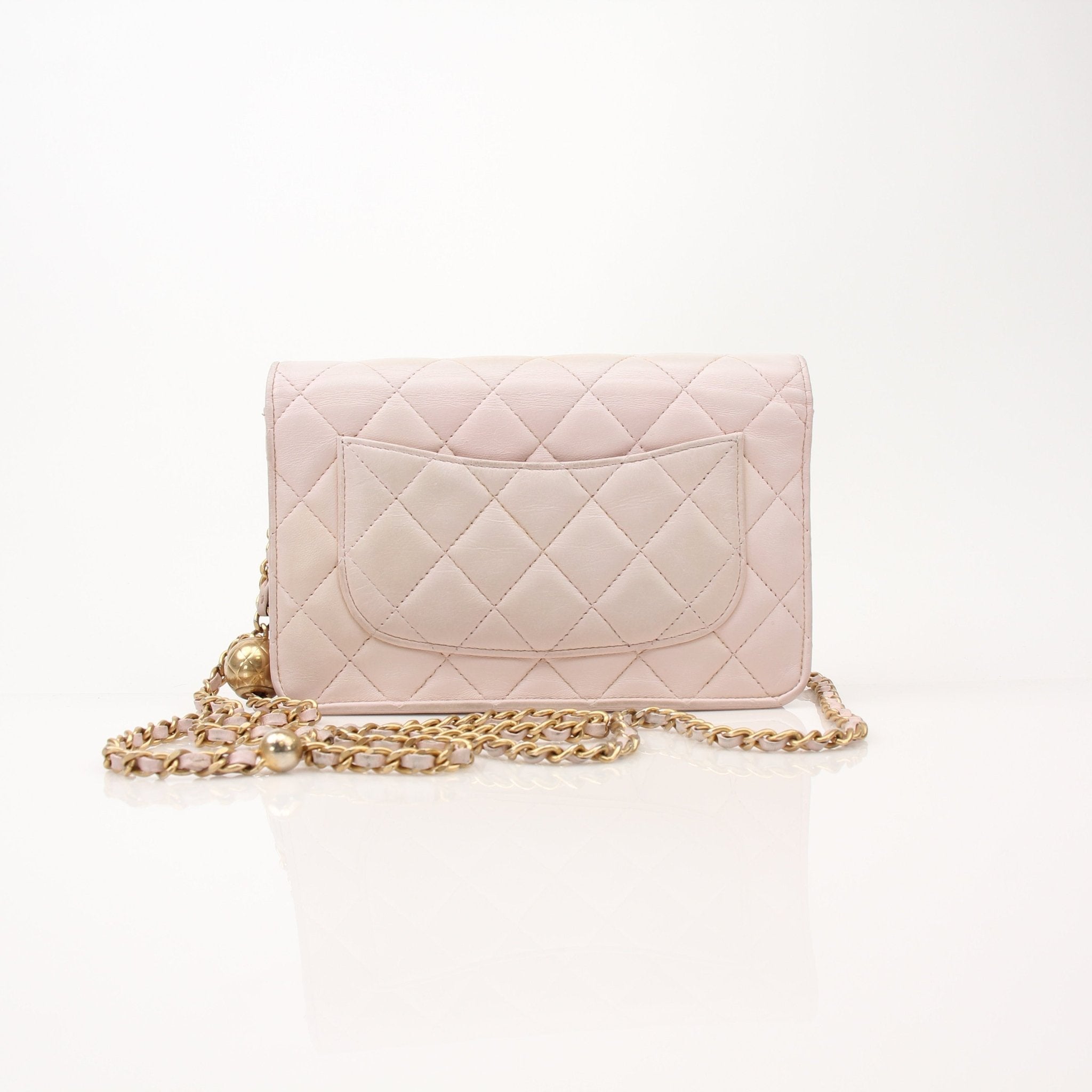 Gold & Beyond Chanel blush pink wallet on chain, stylish leather wallet with chain strap, featuring multiple card slots and a compact design.