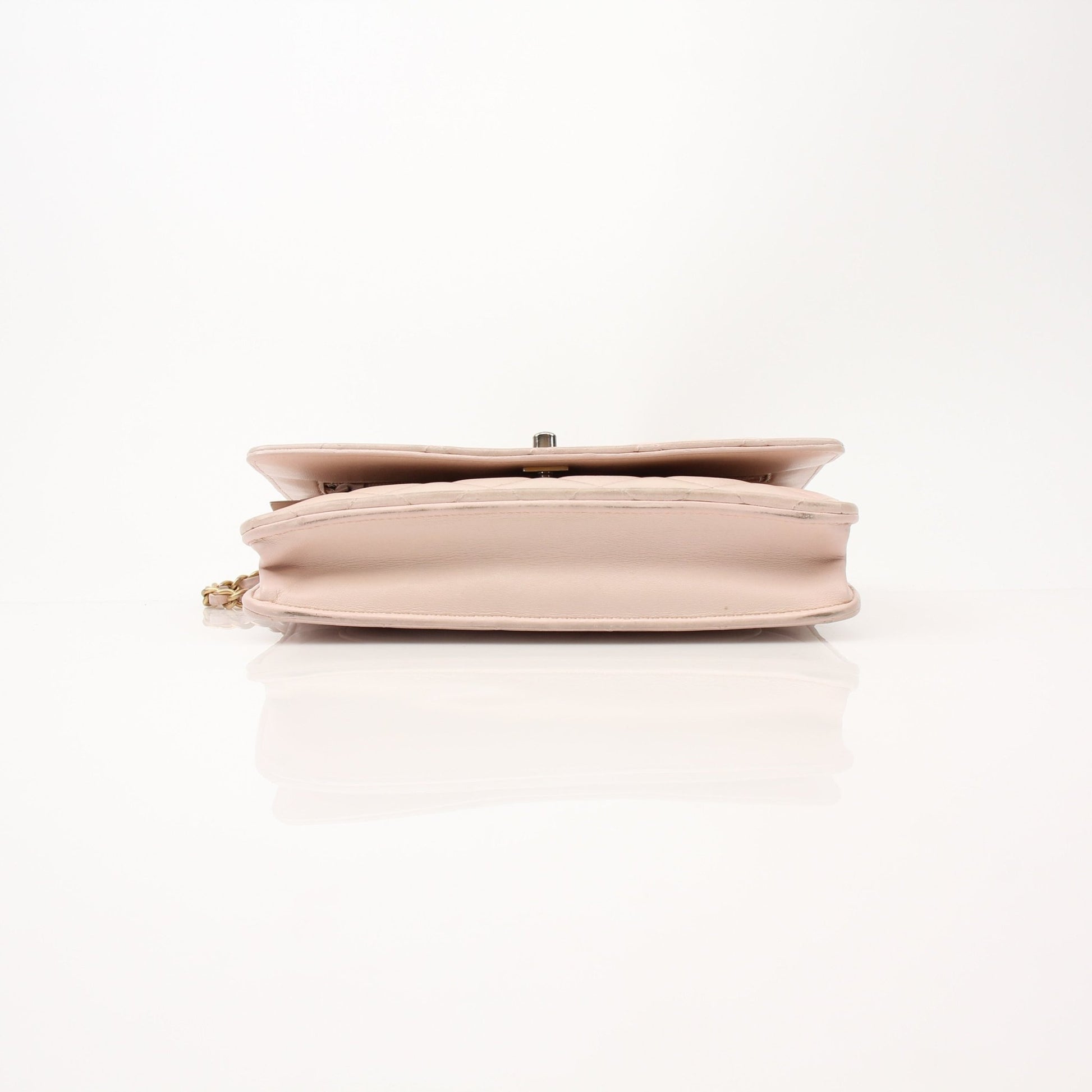 Gold & Beyond Chanel blush pink wallet on chain, featuring a compact wallet design with chain strap and elegant finish.