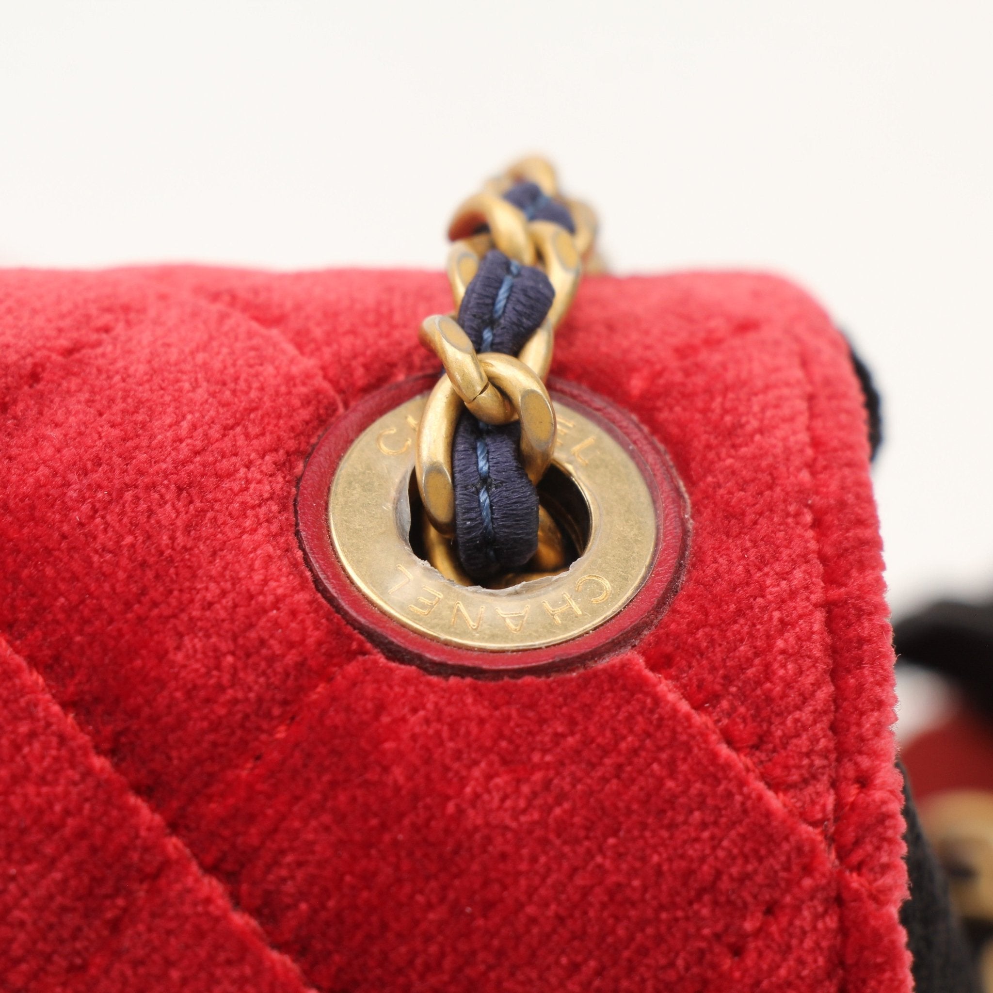 Gold & Beyond Chanel Private Affair Camellia Mini Square Flap Bag handbag with gold chain strap and floral design.