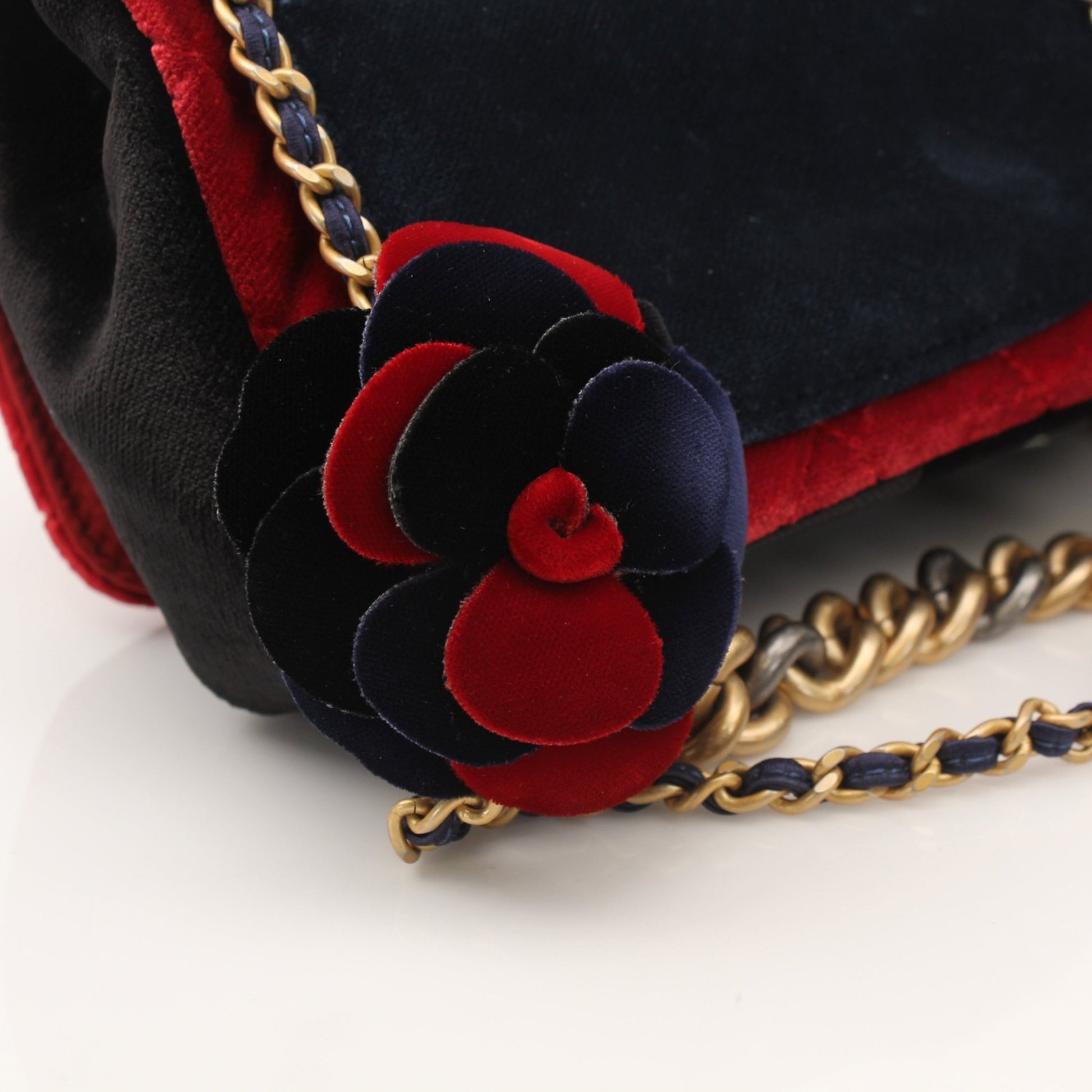 Gold & Beyond Chanel Private Affair Camellia Mini Square Flap Bag handbag with gold hardware and floral design.