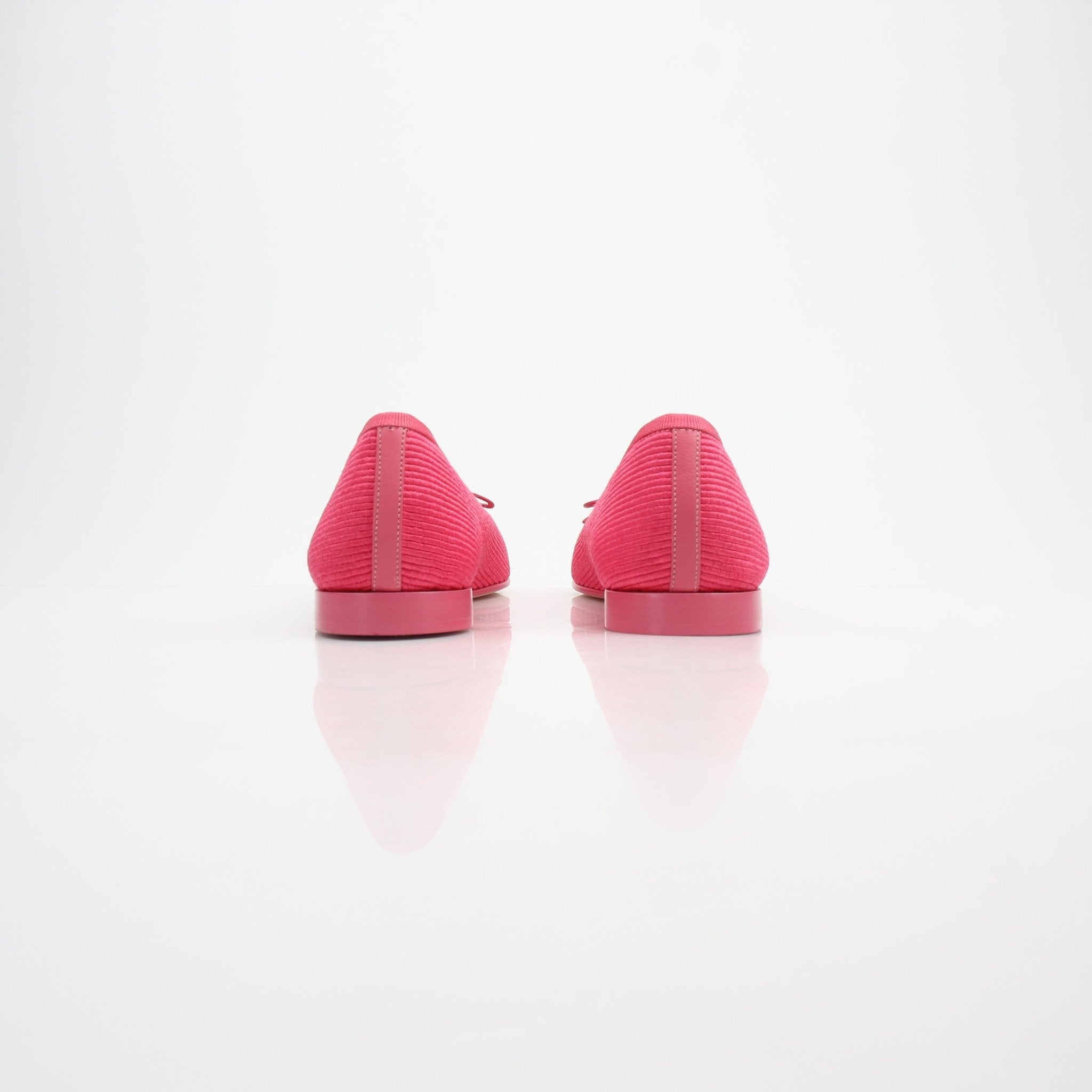 Pink Chanel corduroy ballerina flats with CC bow detail, stylish shoes by Gold & Beyond.