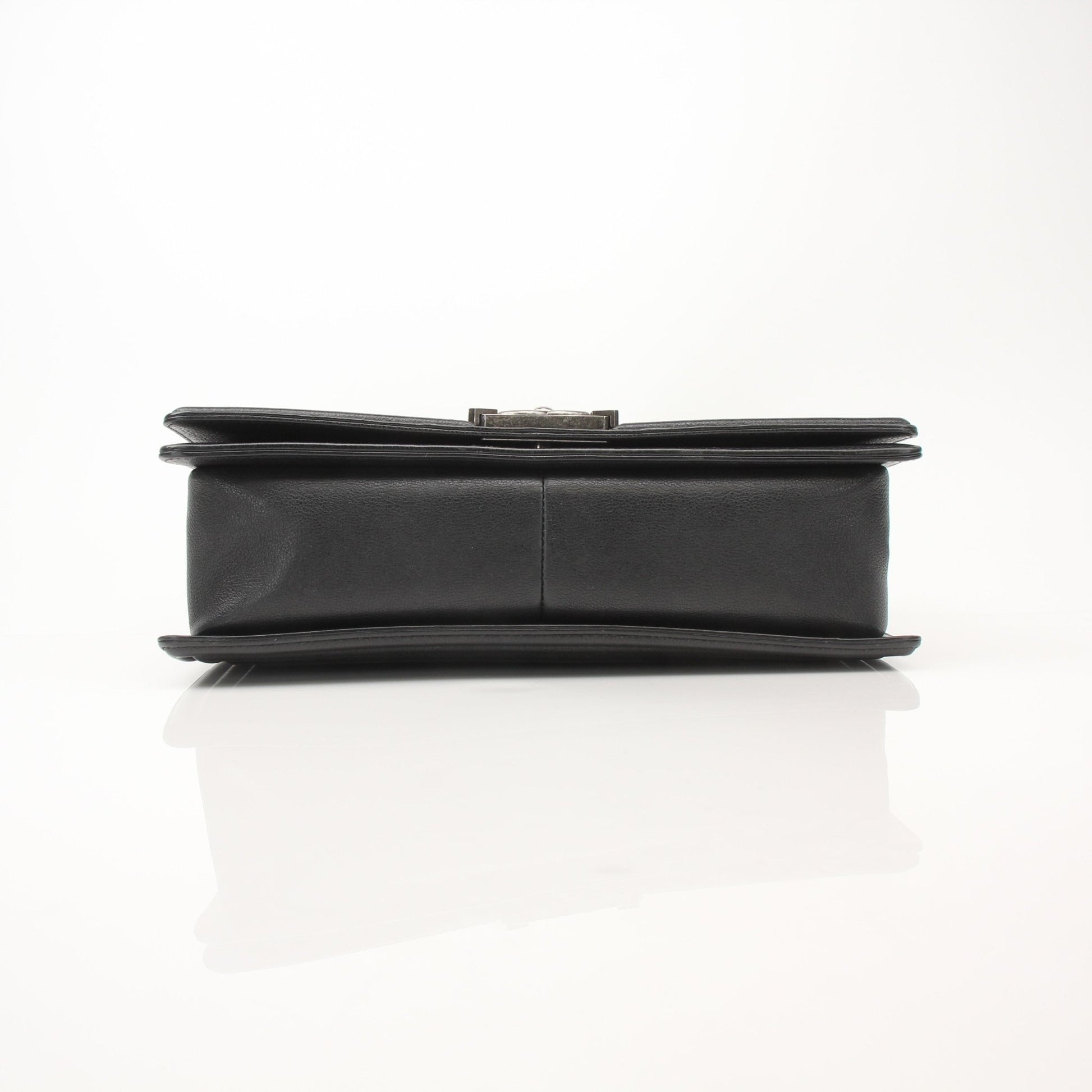 Gold & Beyond Chanel Boy Quilted Flap Bag handbag with gold-tone hardware and quilted leather design.
