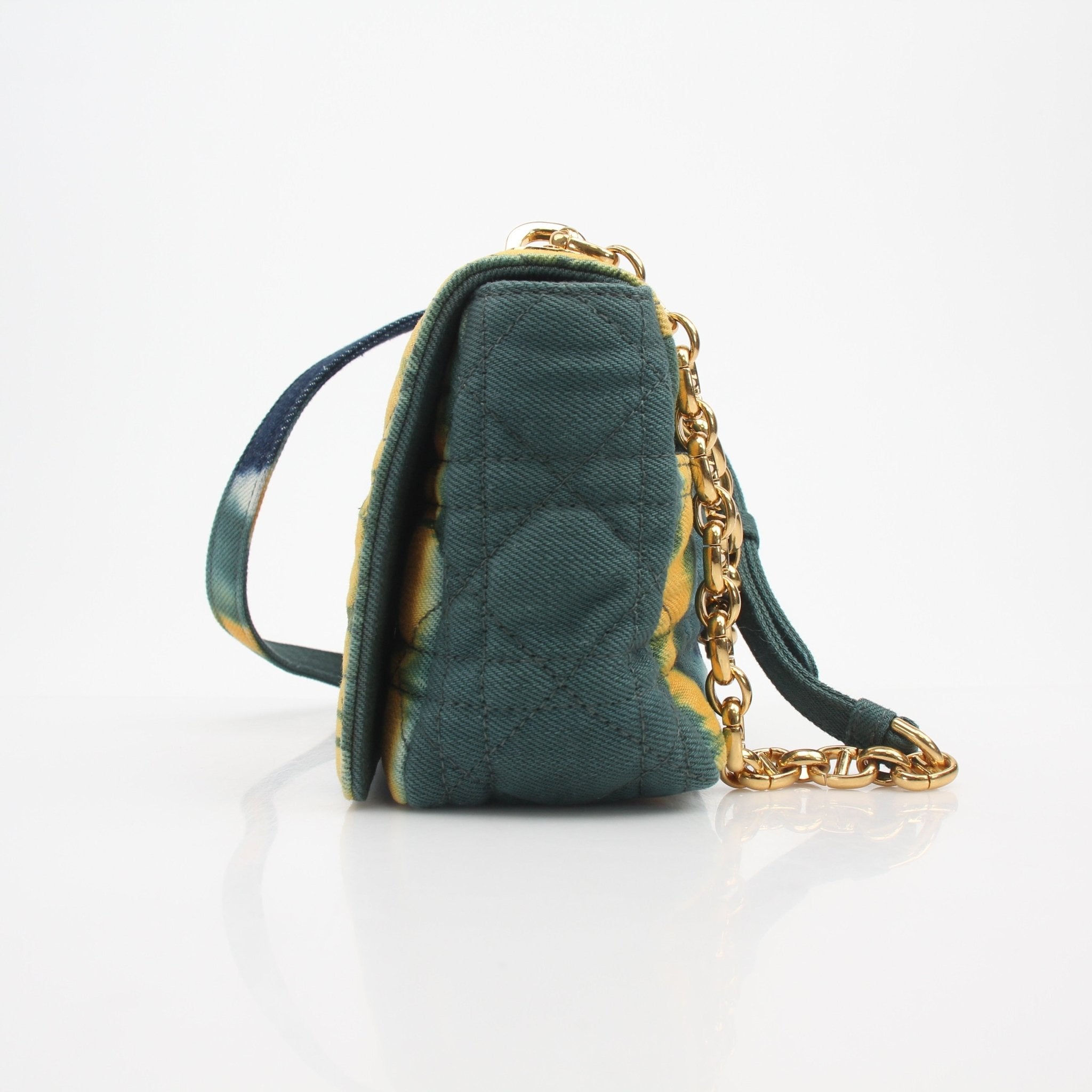 Christian Dior Caro small tie-dye denim shoulder handbag with gold hardware and adjustable strap, stylish and casual accessory.