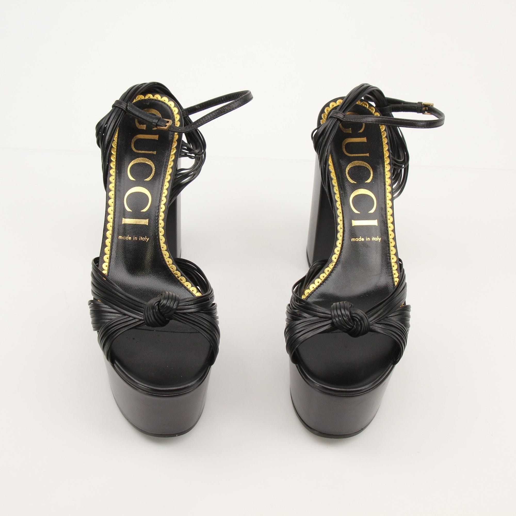 Gold &amp; Beyond Gucci Knot Platform Heels with stylish design and open toe, perfect for elegant summer footwear.