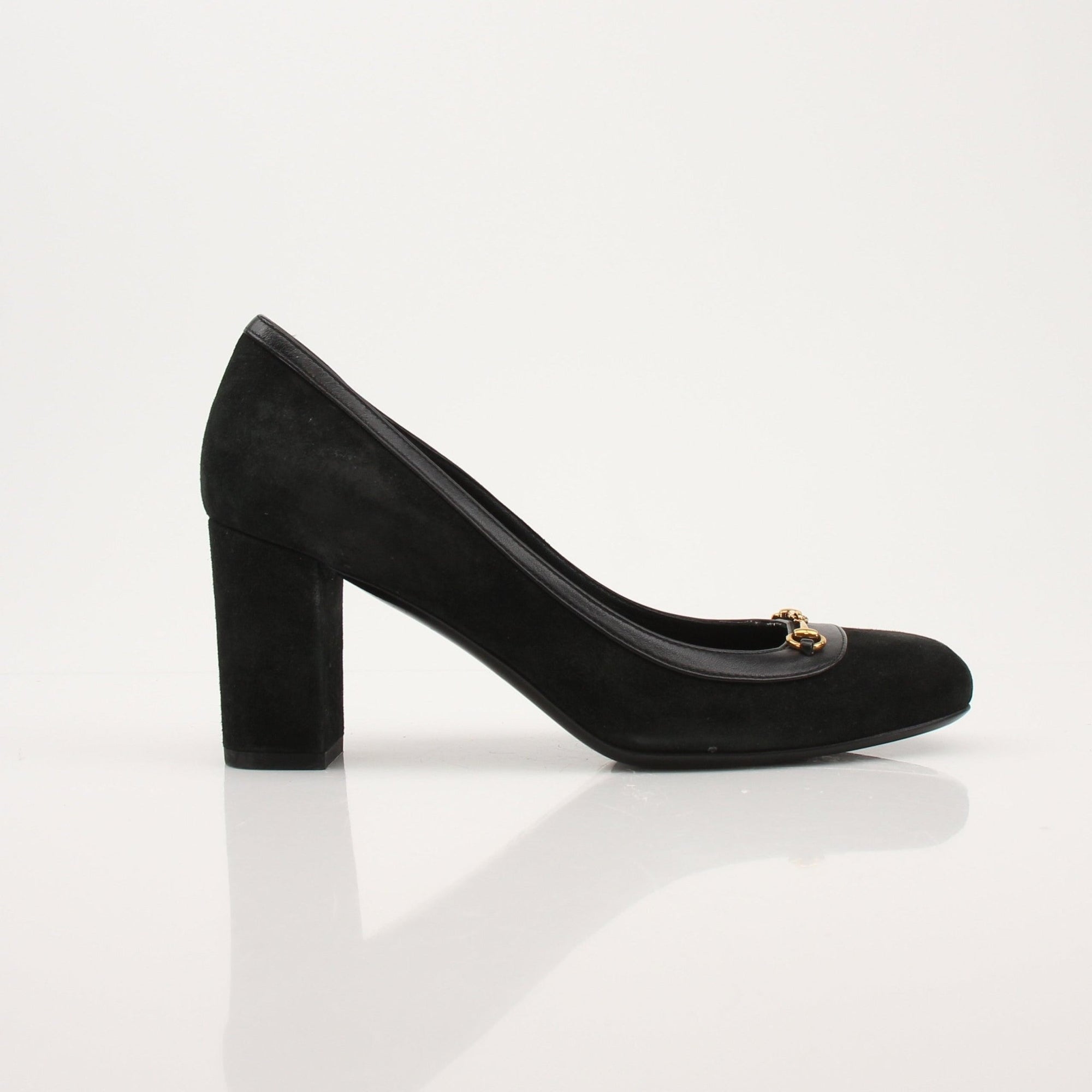 Gold & Beyond Gucci Horsebit leather loafers for men, showing classic slip-on shoes with gold hardware detail.