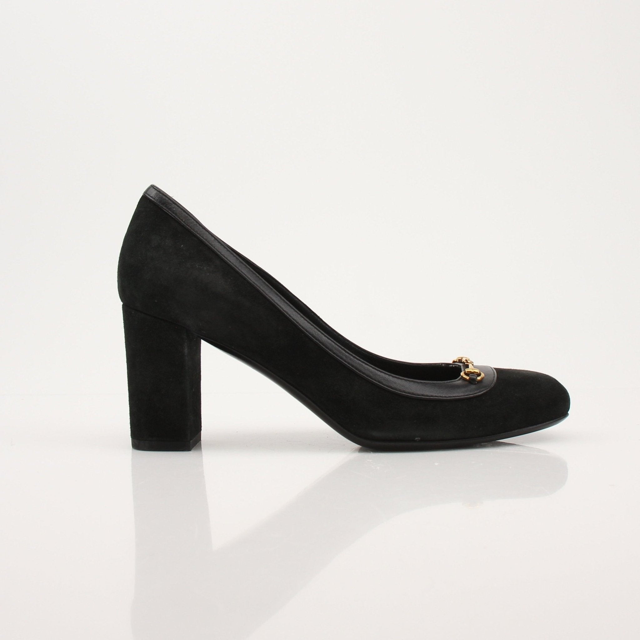 Gold & Beyond Gucci Horsebit leather loafers, stylish men's shoes featuring classic design and high-quality craftsmanship.