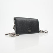 Chanel Camellia Embossed Wallet on Chain Bag