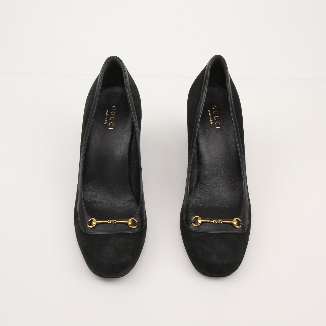 Gold & Beyond Gucci Horsebit leather loafers, stylish men's shoes with signature horsebit detail and classic design.