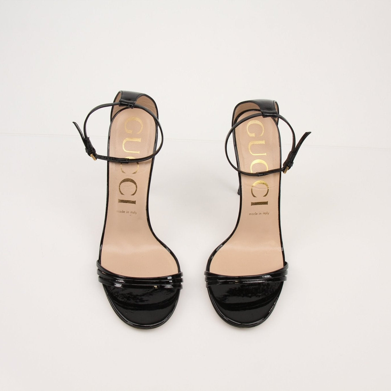 Gold & Beyond Gucci Isle ankle strap heels, stylish women's heels with elegant design and comfortable fit, shown on a neutral background.