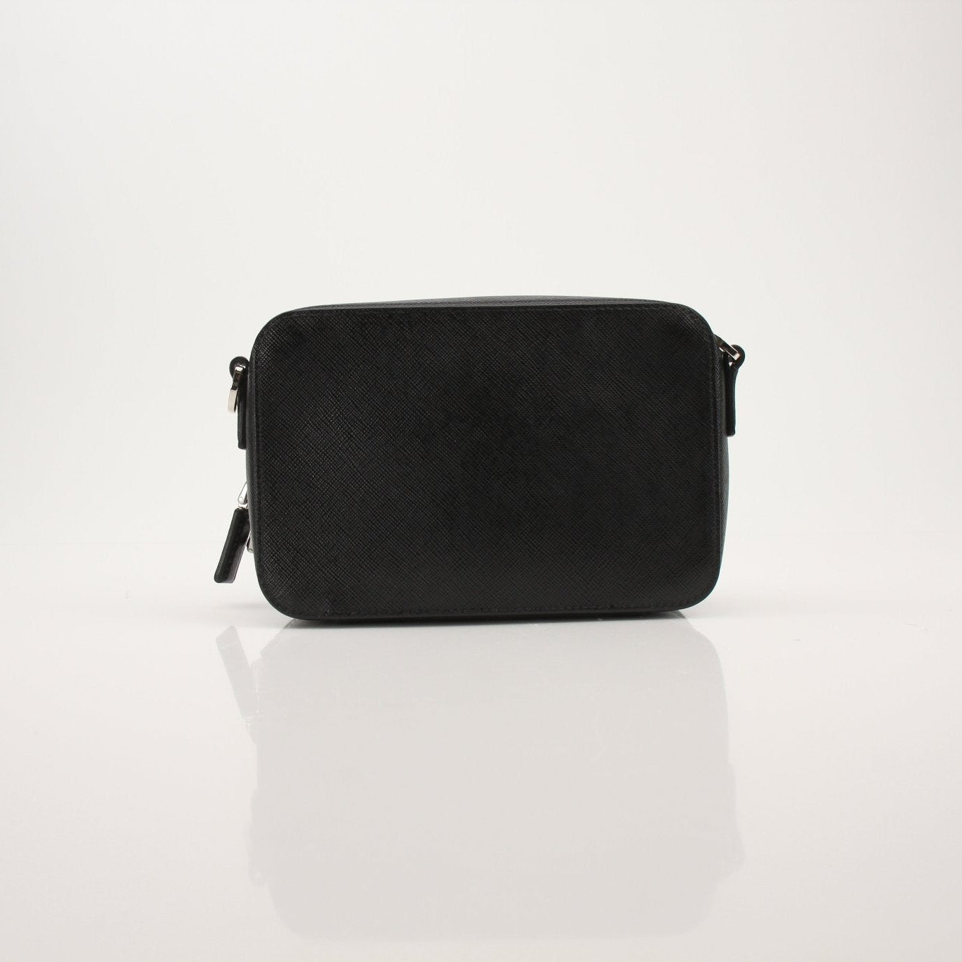 Gold & Beyond Prada Brique handbag with sleek design and structured shape, featuring high-quality leather and silver hardware.