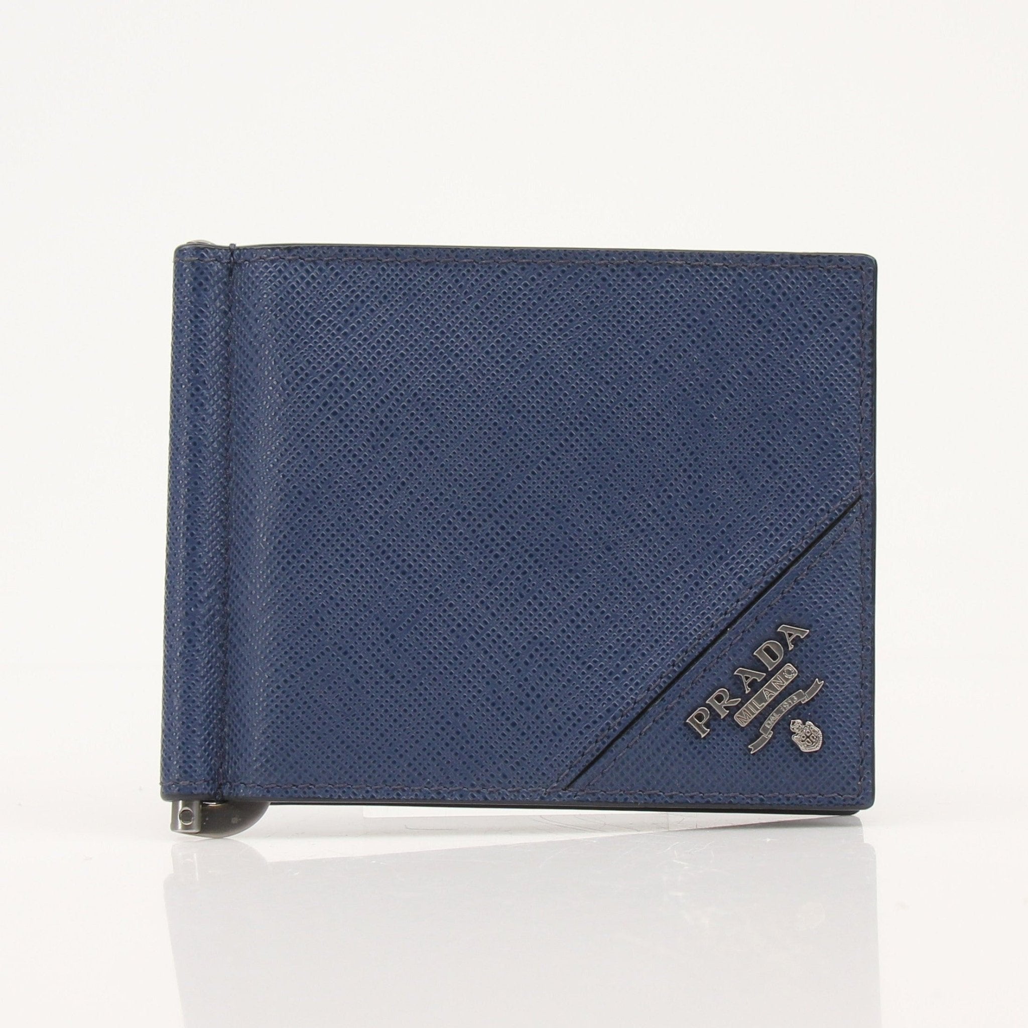 Prada Saffiano leather money clip wallet with gold-tone clip and compact design, featuring durable saffiano texture.