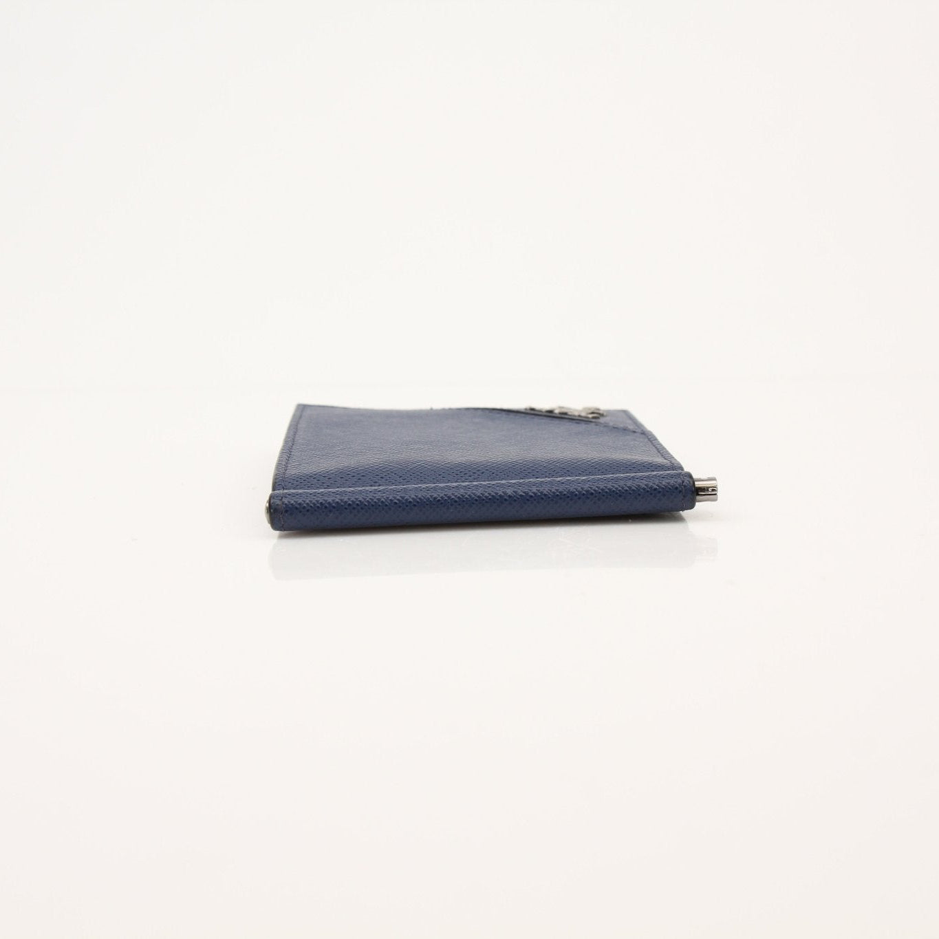 Prada Saffiano leather money clip wallet with gold-tone clip and compact design, crafted for style and functionality.