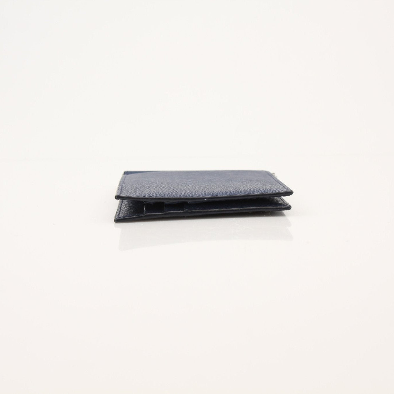 Prada Saffiano leather money clip wallet by Gold & Beyond, featuring a sleek design with a durable saffiano leather finish.