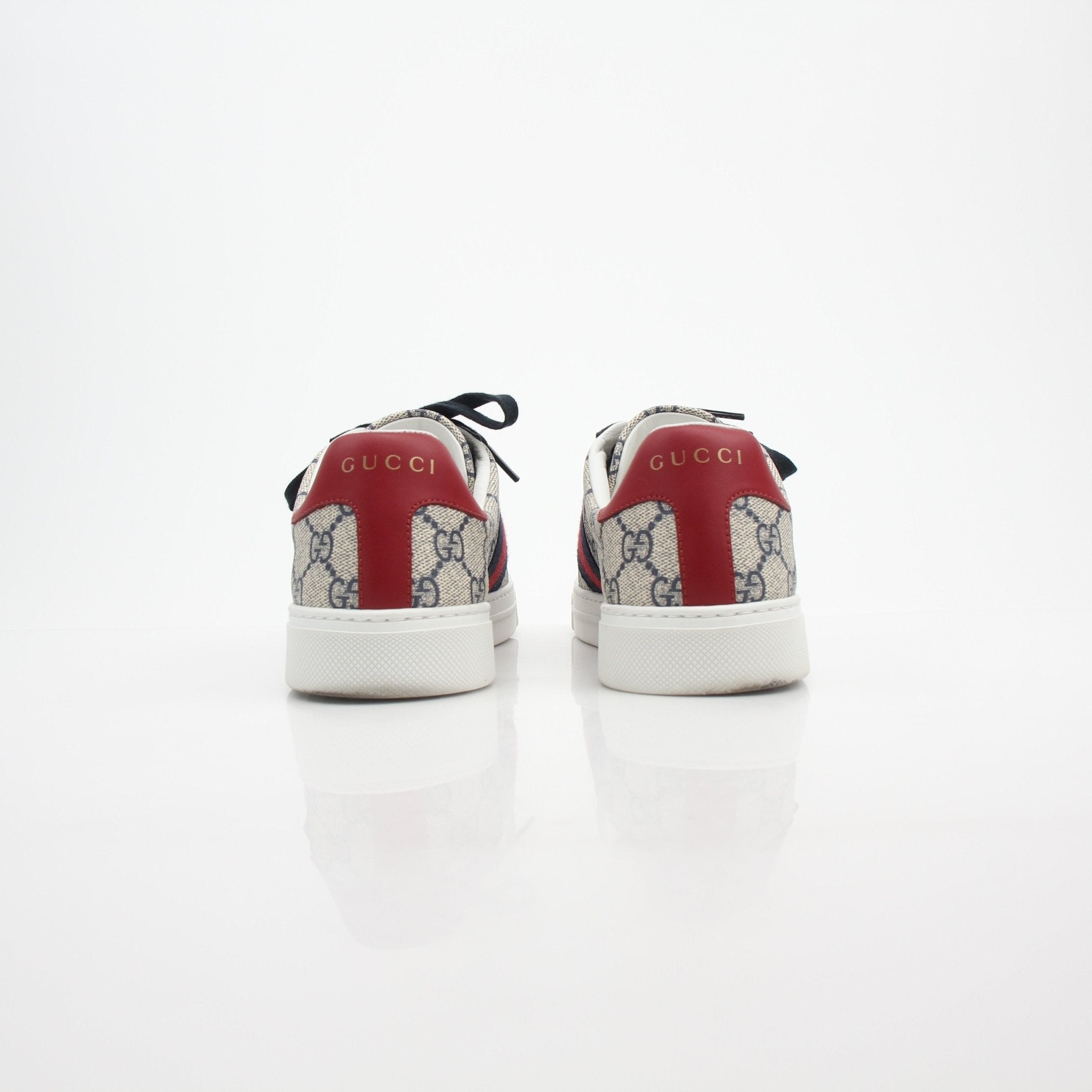 Gucci Women’s Ace GG Supreme Monogram Web sneakers, stylish shoes with iconic monogram and web stripe design.