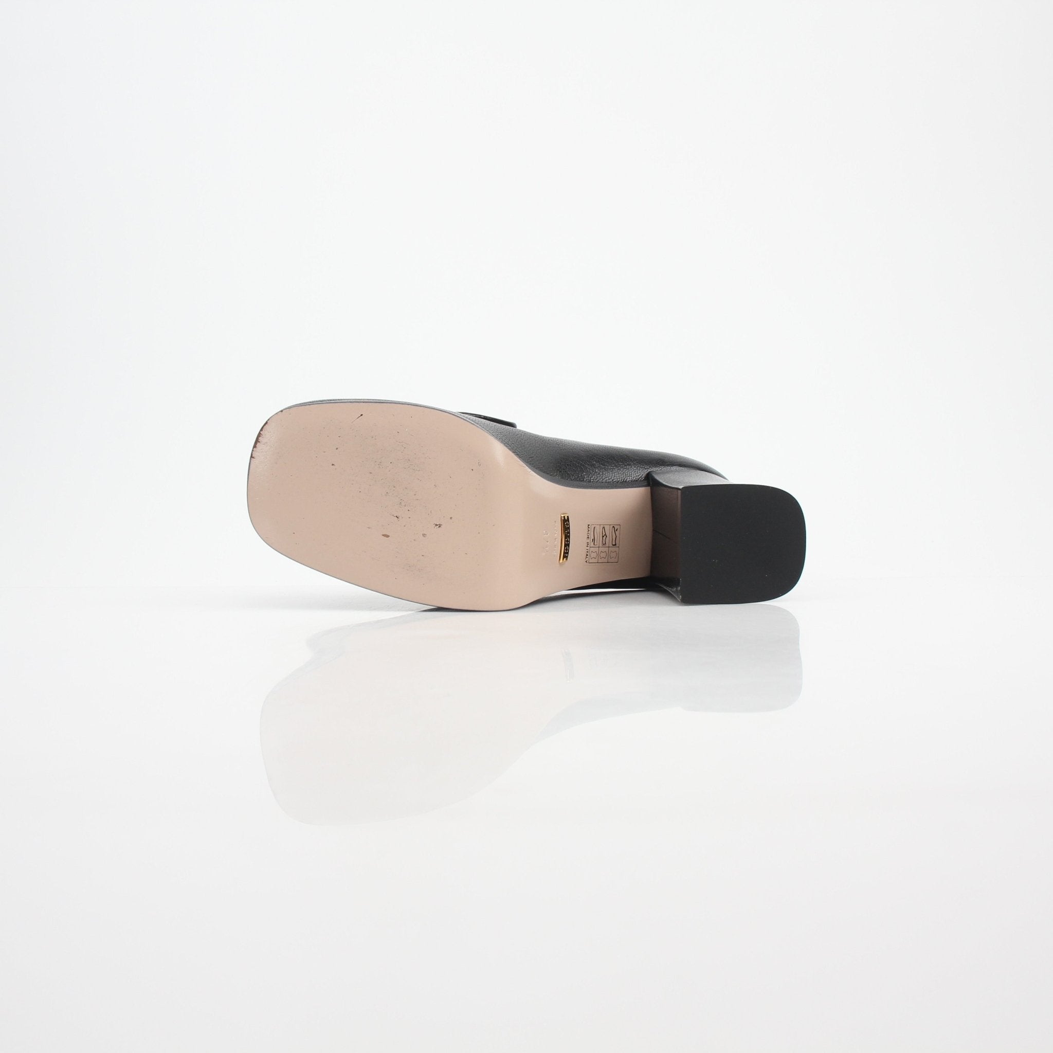 Gold & Beyond Gucci women's Houdan horsebit platform loafer pumps, stylish leather footwear with decorative horsebit detail.