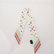Louis Vuitton x Murakami multicolor bandeau scarf with floral and character patterns, displayed as a vibrant accessory.