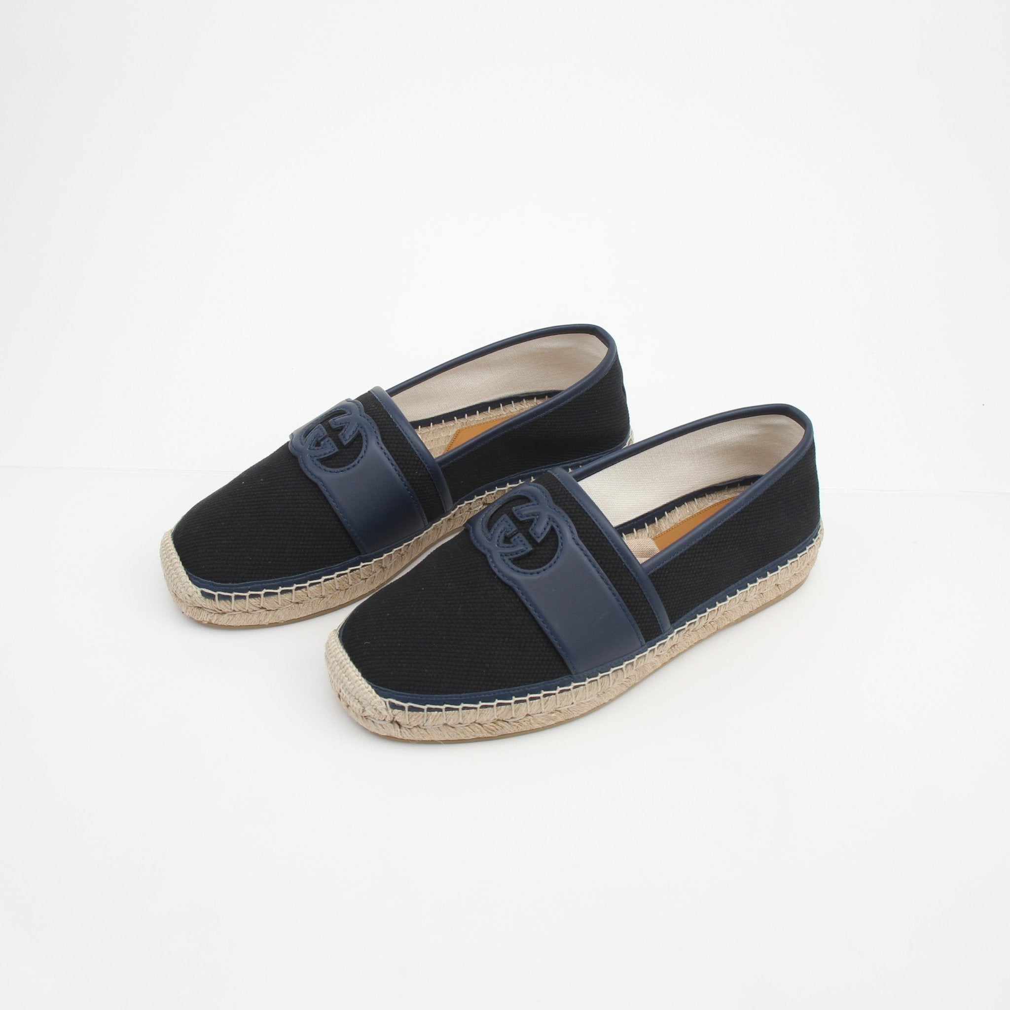 Gucci men's interlocking G canvas espadrille shoes with natural jute soles and slip-on design, detailed close-up view.