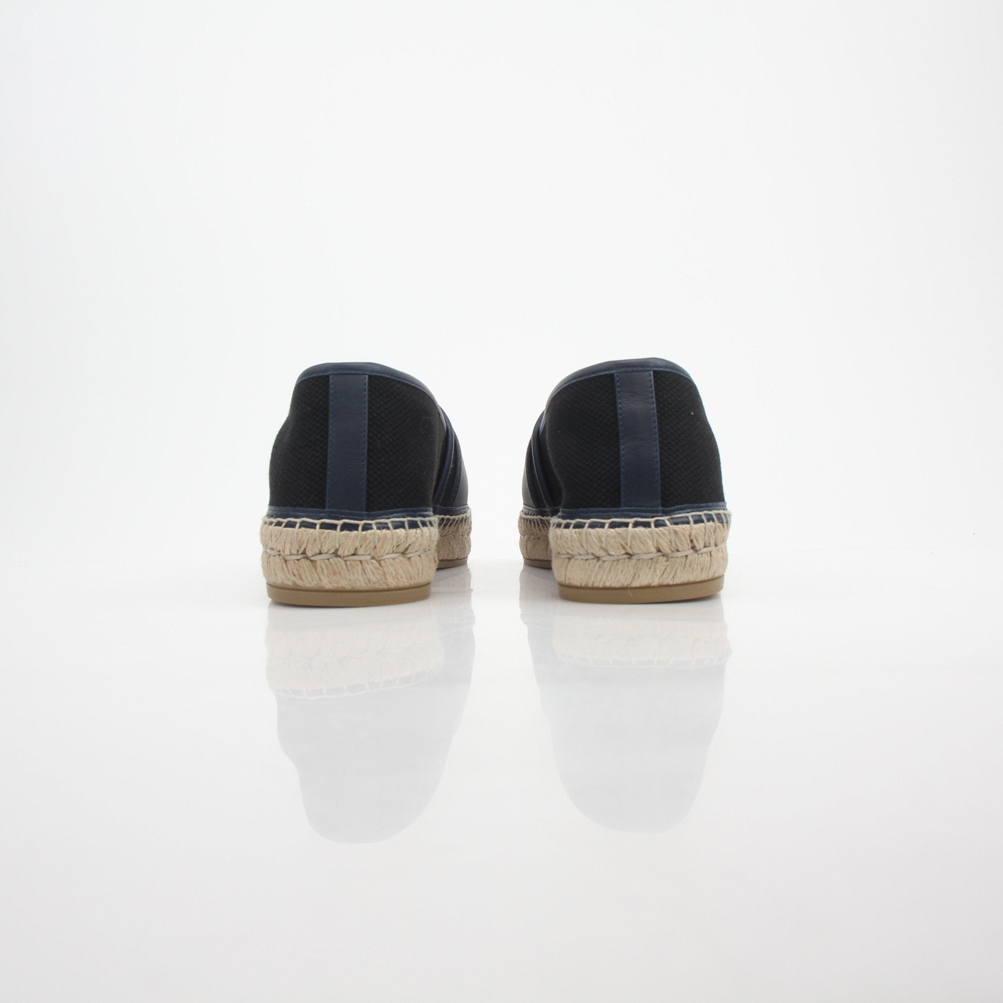 Gucci men's Interlocking G canvas espadrille shoes with woven soles and casual slip-on style.