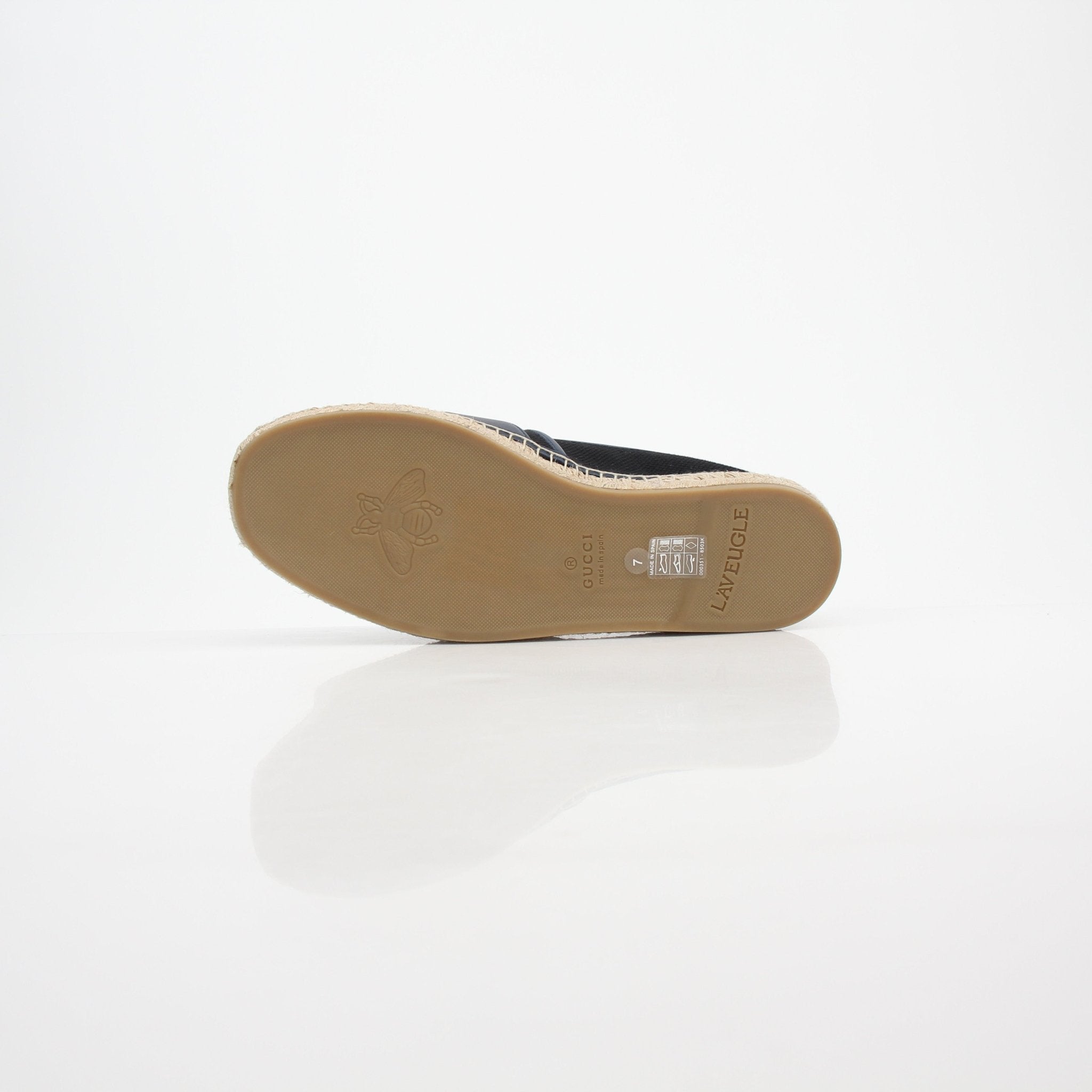 Gucci men's interlocking G canvas espadrille shoes with beige and brown design, casual slip-on footwear for men.