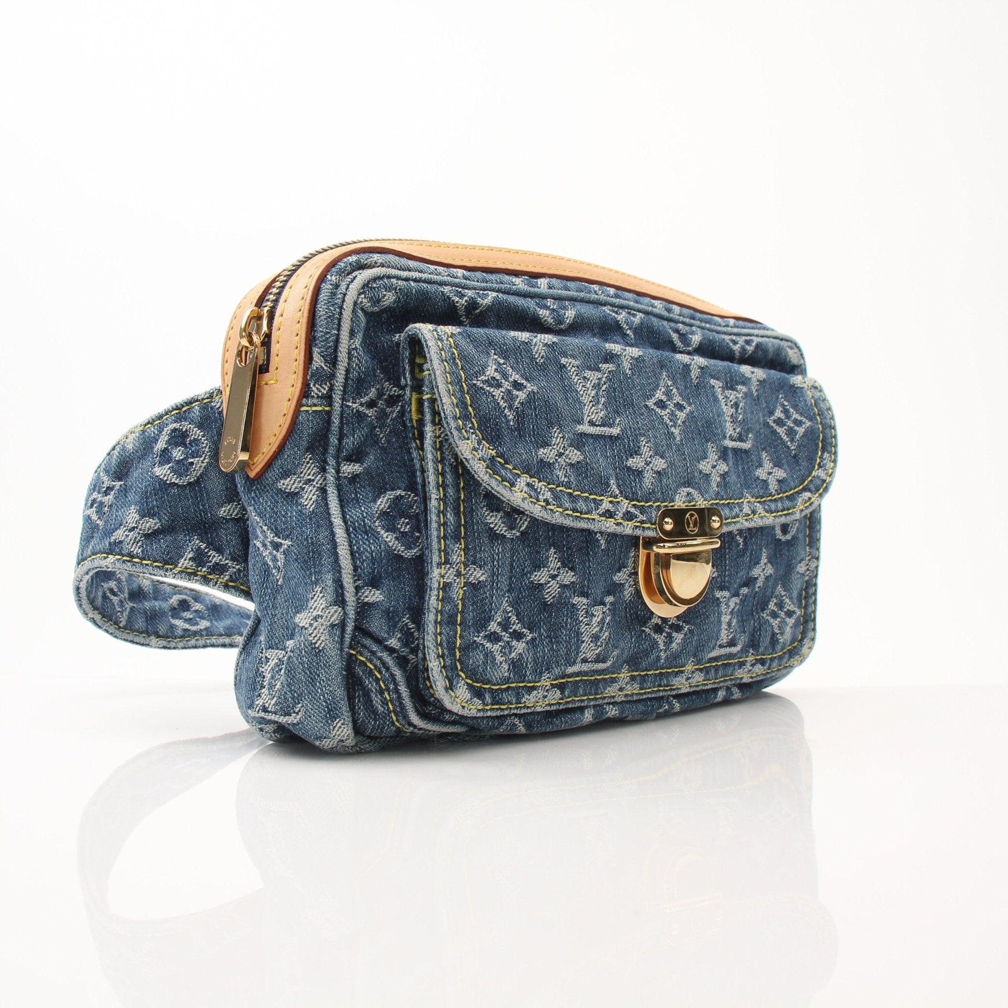 Louis Vuitton denim bum bag handbag with adjustable strap and gold accents, featuring classic monogram design.