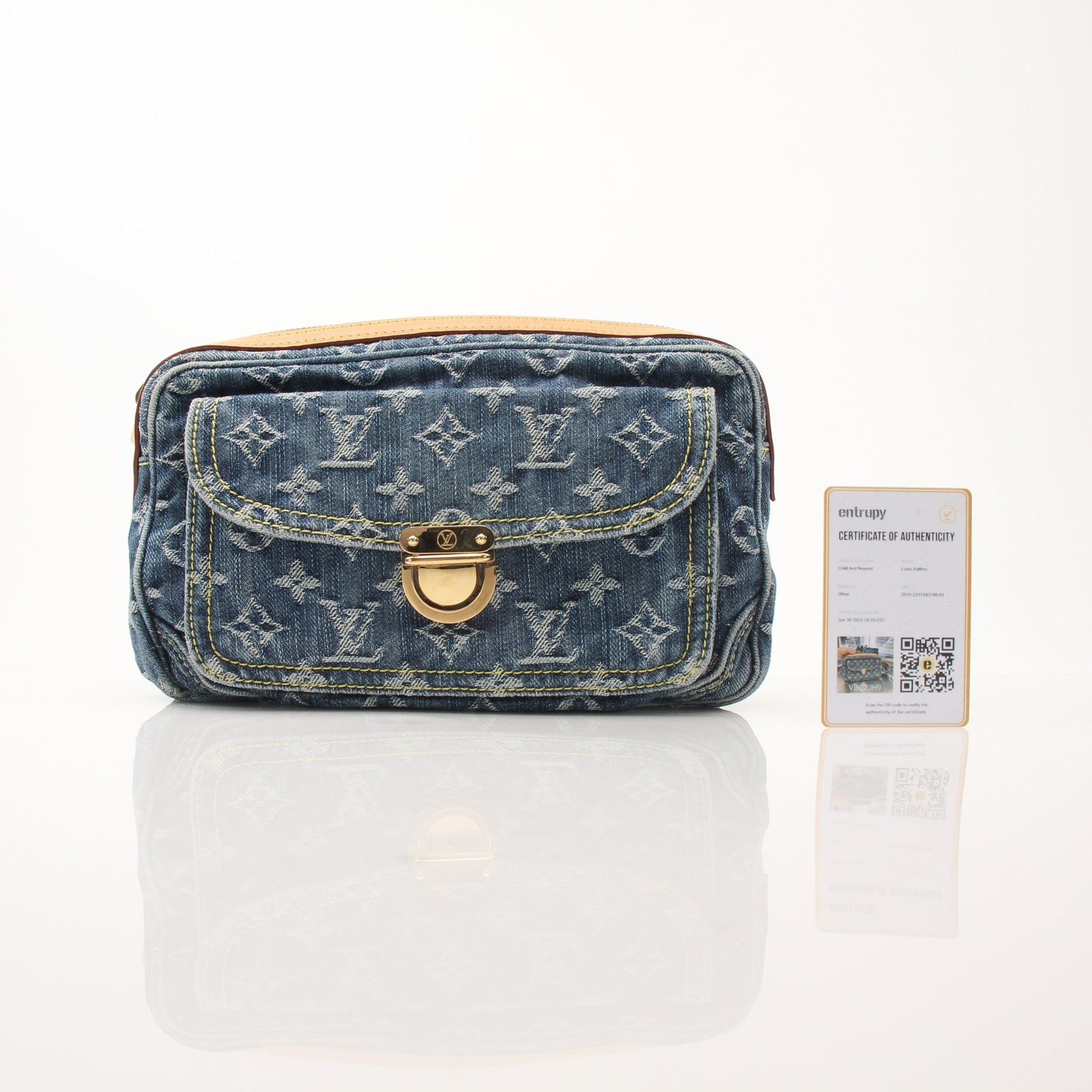 Louis Vuitton denim bum bag handbag with adjustable strap and gold accents, casual and stylish accessory.