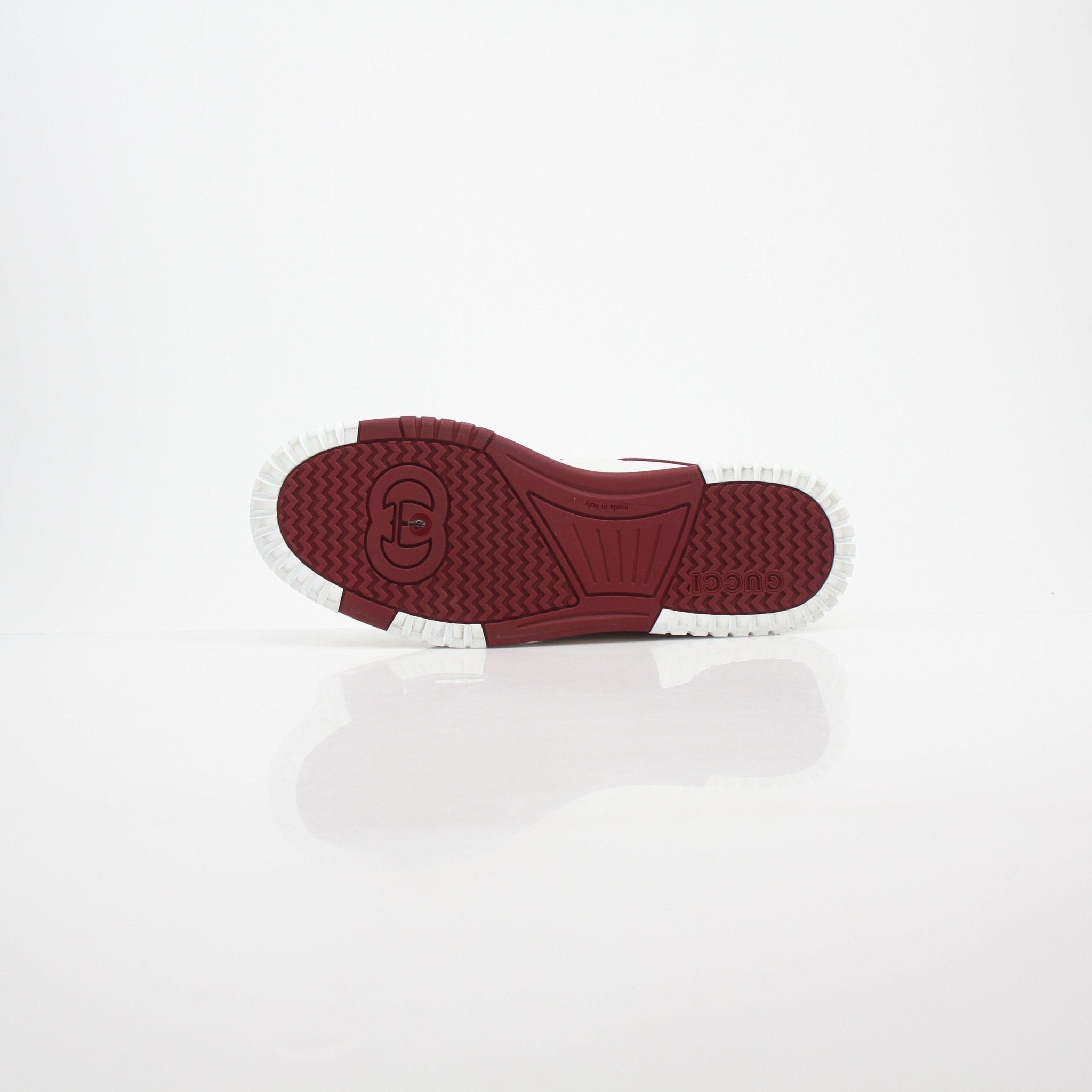 Gold & Beyond Gucci men's Re-Web low top leather sneakers with black and green web stripe, stylish casual shoes.